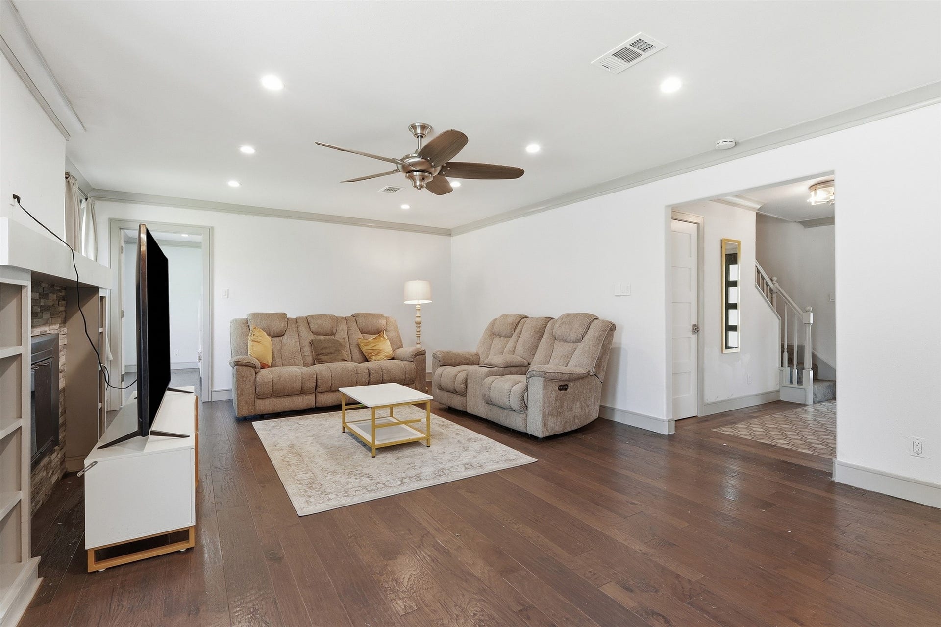 6518 Elmgrove Road, Spring, TX 77389 Generously sized living room with hardwood floors, recessed lighting, and plenty of space to gather and unwind.