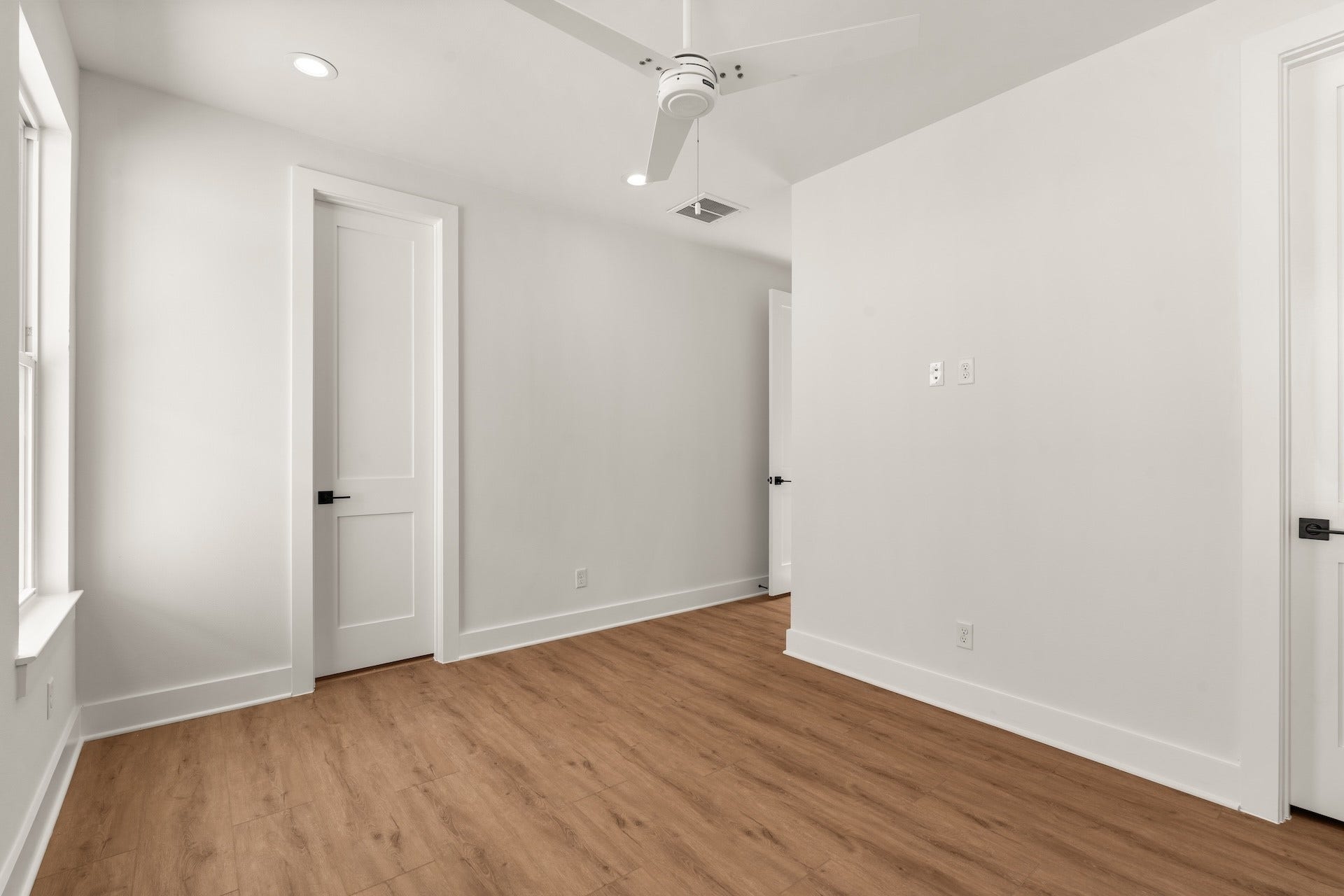 Quiet guest retreat offering flexible space and seamless flow to adjacent living areas.