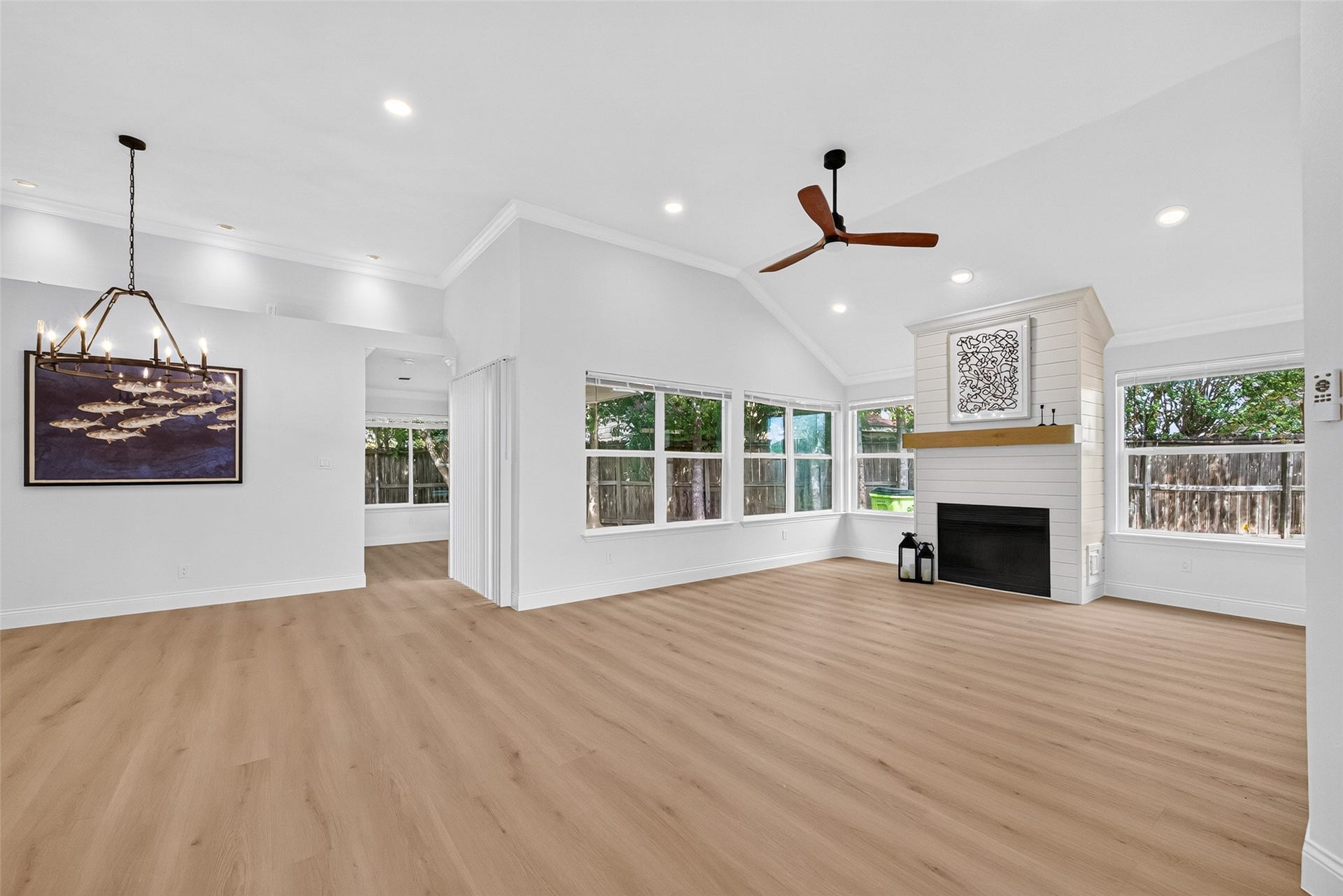 7842 Micheline Circle, Missouri City, TX 77071 Open floor plan with high ceiling featuring wide hallway with crown molding & refinished fireplace