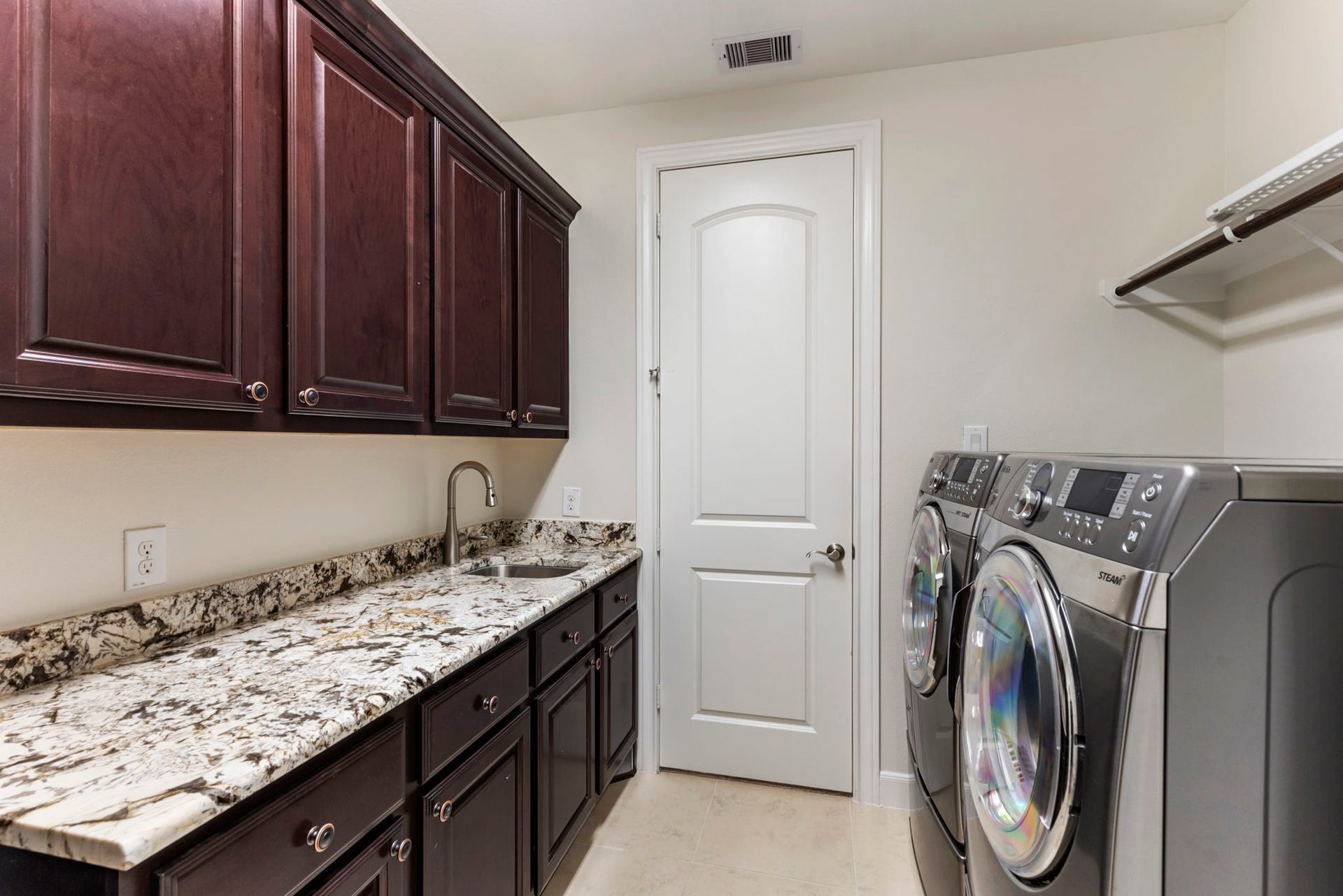 103 Blue Gilia Court, Montgomery, TX 77316 Utility room equipped with washer and dryer.
