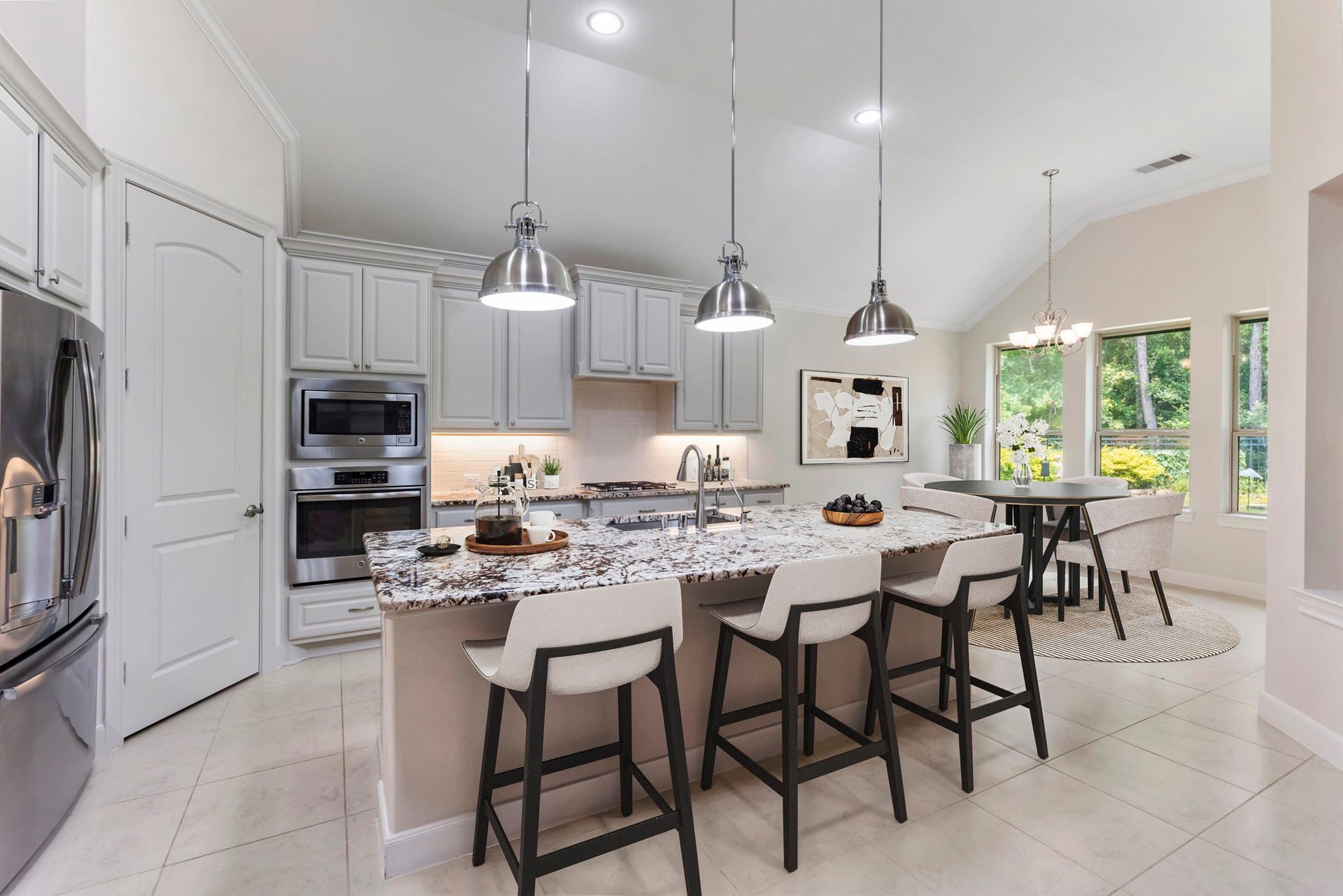 103 Blue Gilia Court, Montgomery, TX 77316 Kitchen overlooking the family room (Virtually Staged)