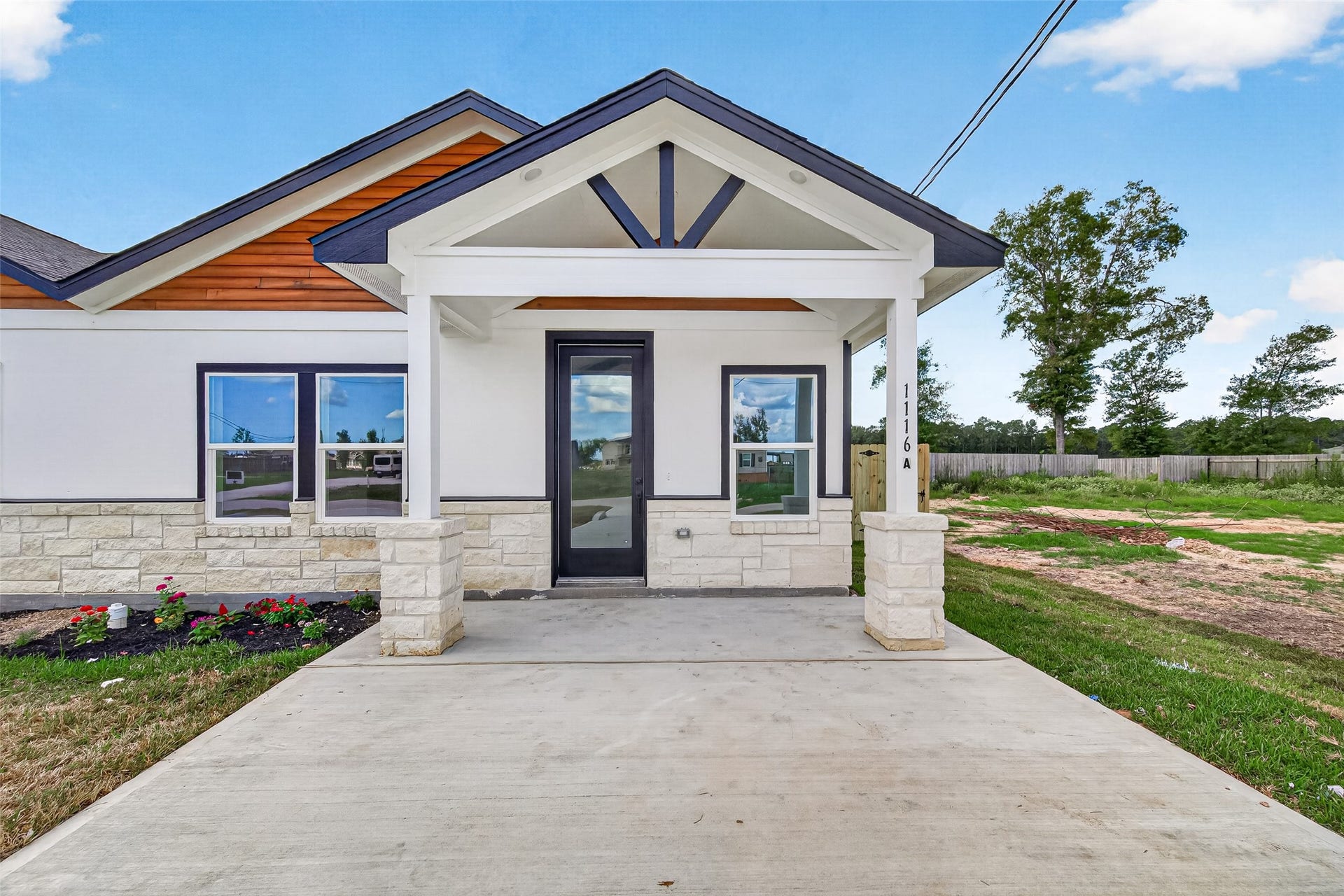 1234 Peter Pine St A/B, Huffman, TX 77336 Unit A. Representative photo of another listing featuring the same layout and finishes.