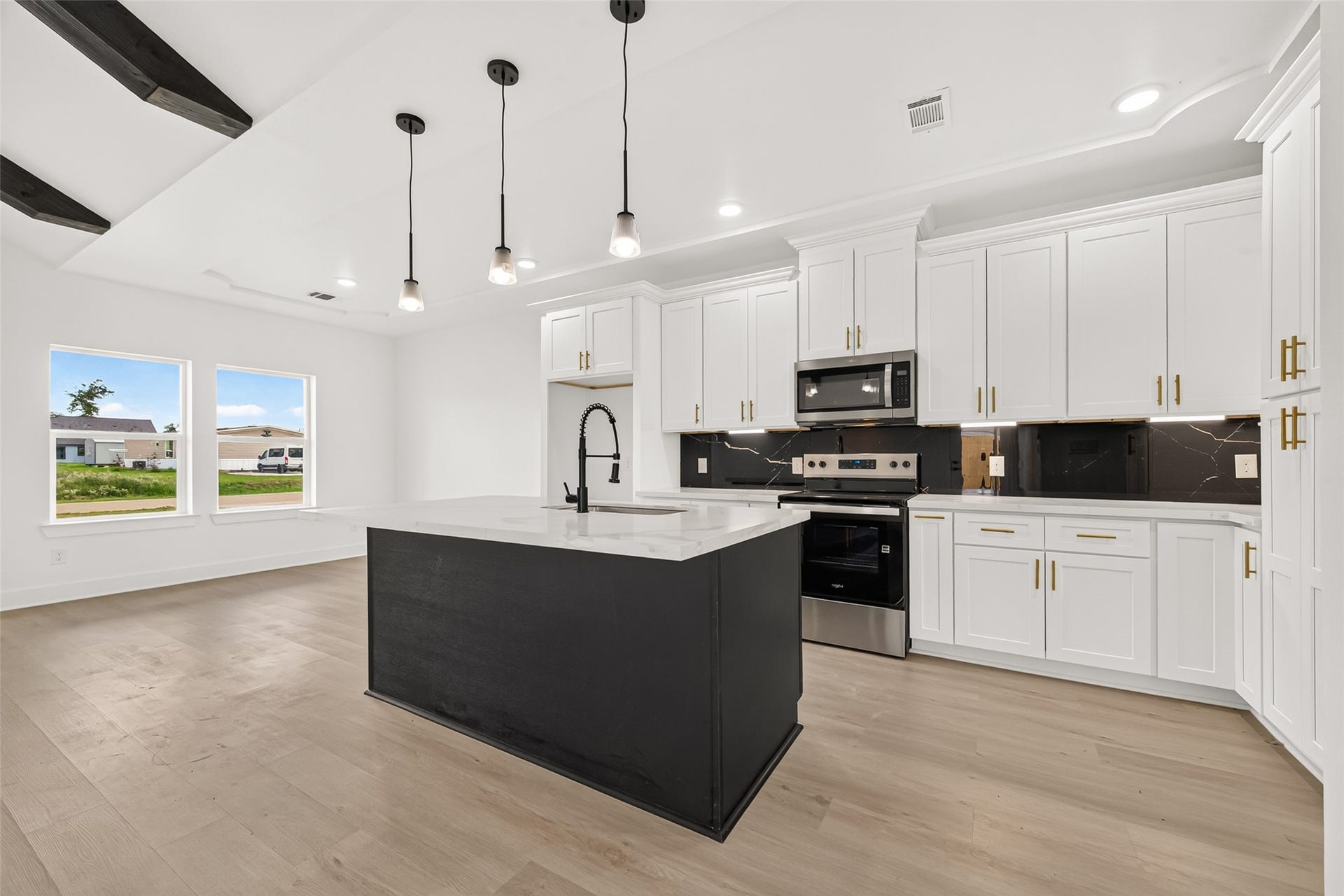 1234 Peter Pine St A/B, Huffman, TX 77336 Unit A. Representative photo of another listing featuring the same layout and finishes.