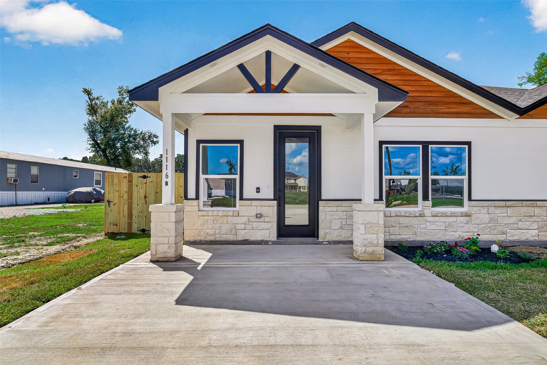 1234 Peter Pine St A/B, Huffman, TX 77336 Unit B. Representative photo of another listing featuring the same layout and finishes.