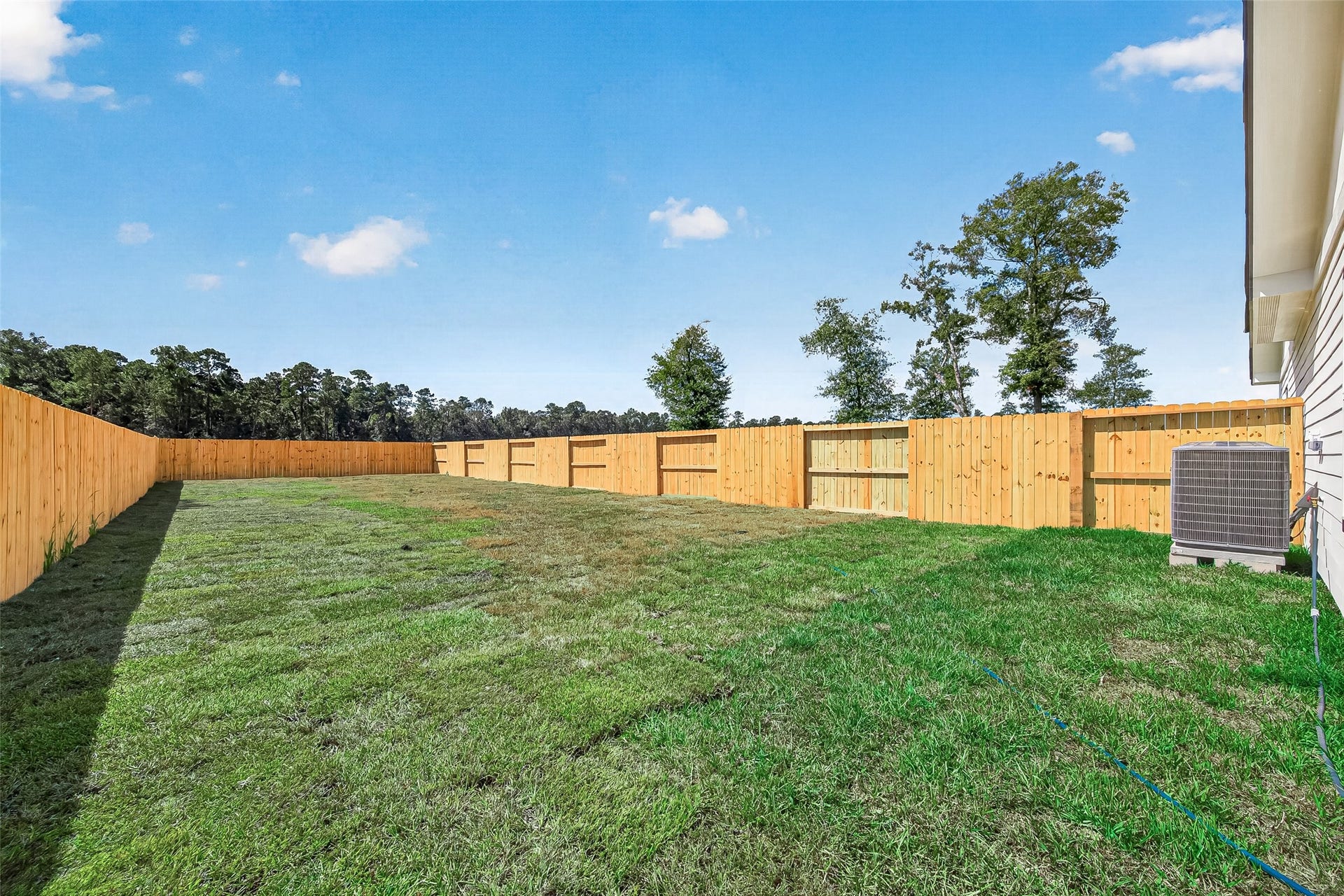 1234 Peter Pine St A/B, Huffman, TX 77336 Unit B. Representative photo of another listing featuring the same layout and finishes.