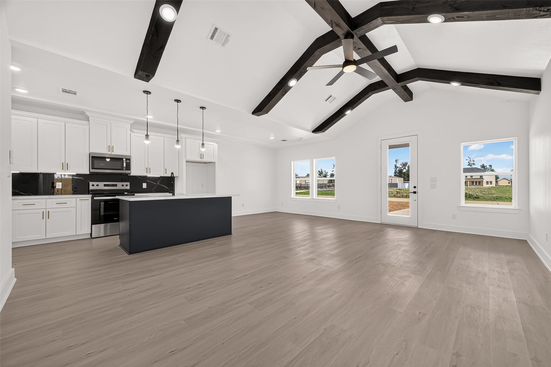 1234 Peter Pine St A/B, Huffman, TX 77336 Unit B. Representative photo of another listing featuring the same layout and finishes.