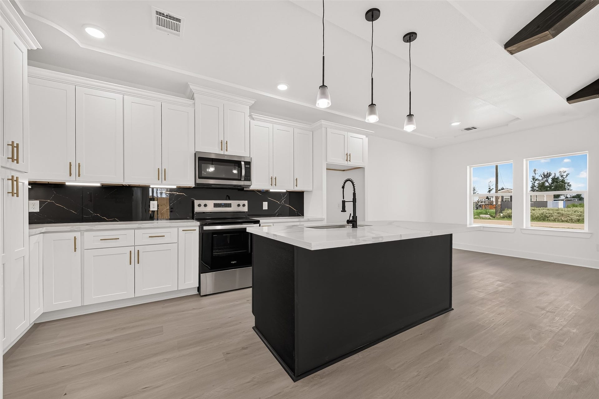 1234 Peter Pine St A/B, Huffman, TX 77336 Unit B. Representative photo of another listing featuring the same layout and finishes.