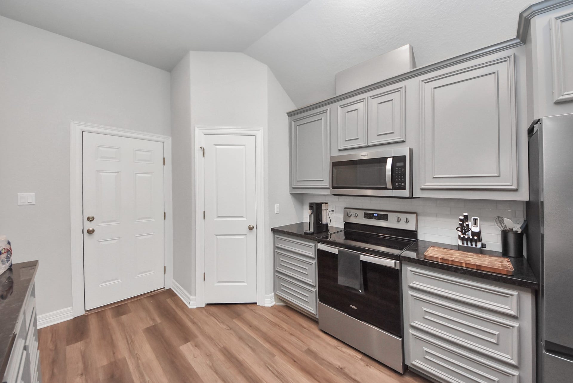 1023 S Anderson Street, Angleton, TX 77515 Kitchen featuring a walk-in pantry for additional storage