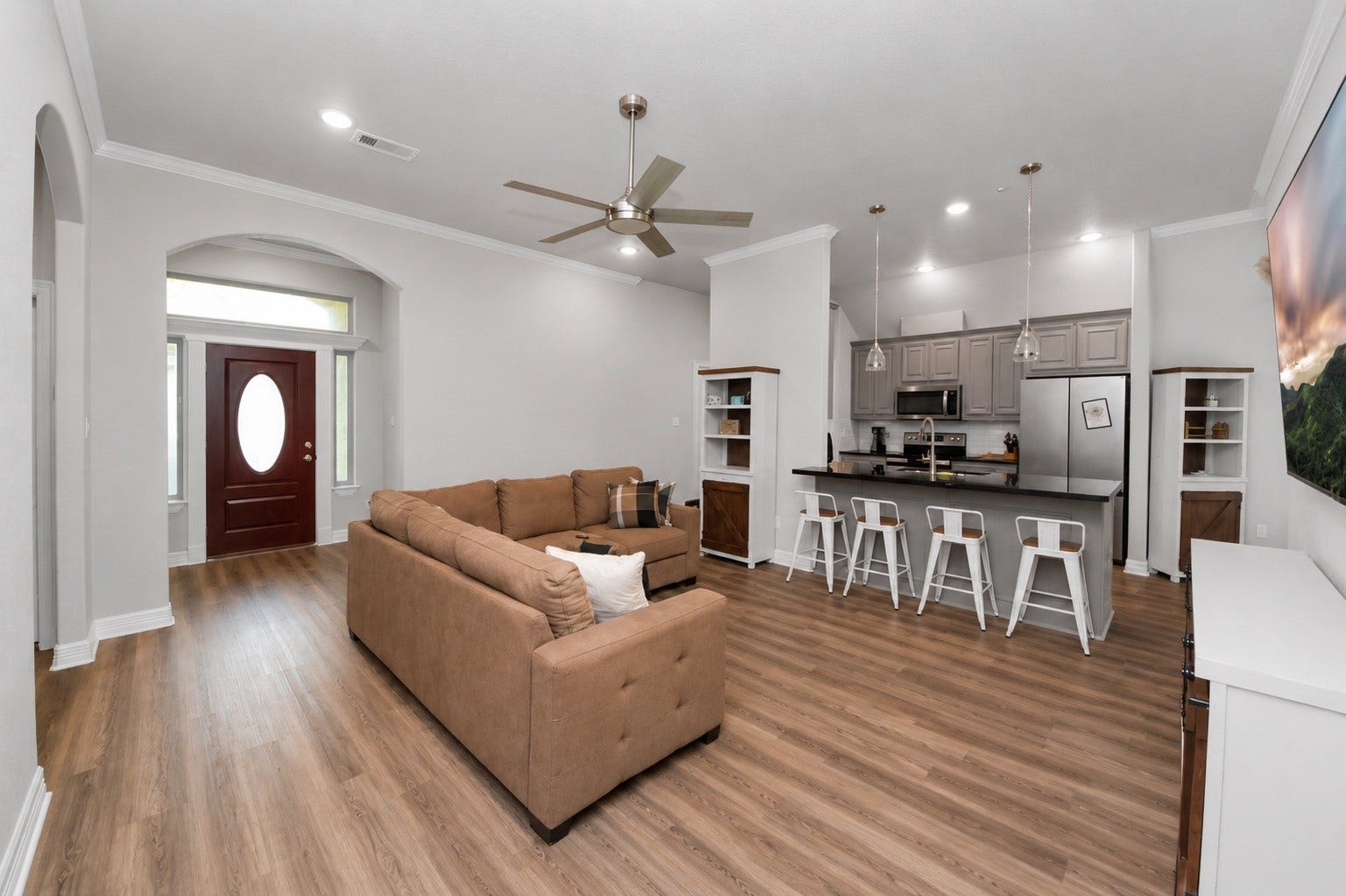 1023 S Anderson Street, Angleton, TX 77515 Open-concept living room seamlessly connecting to the kitchen