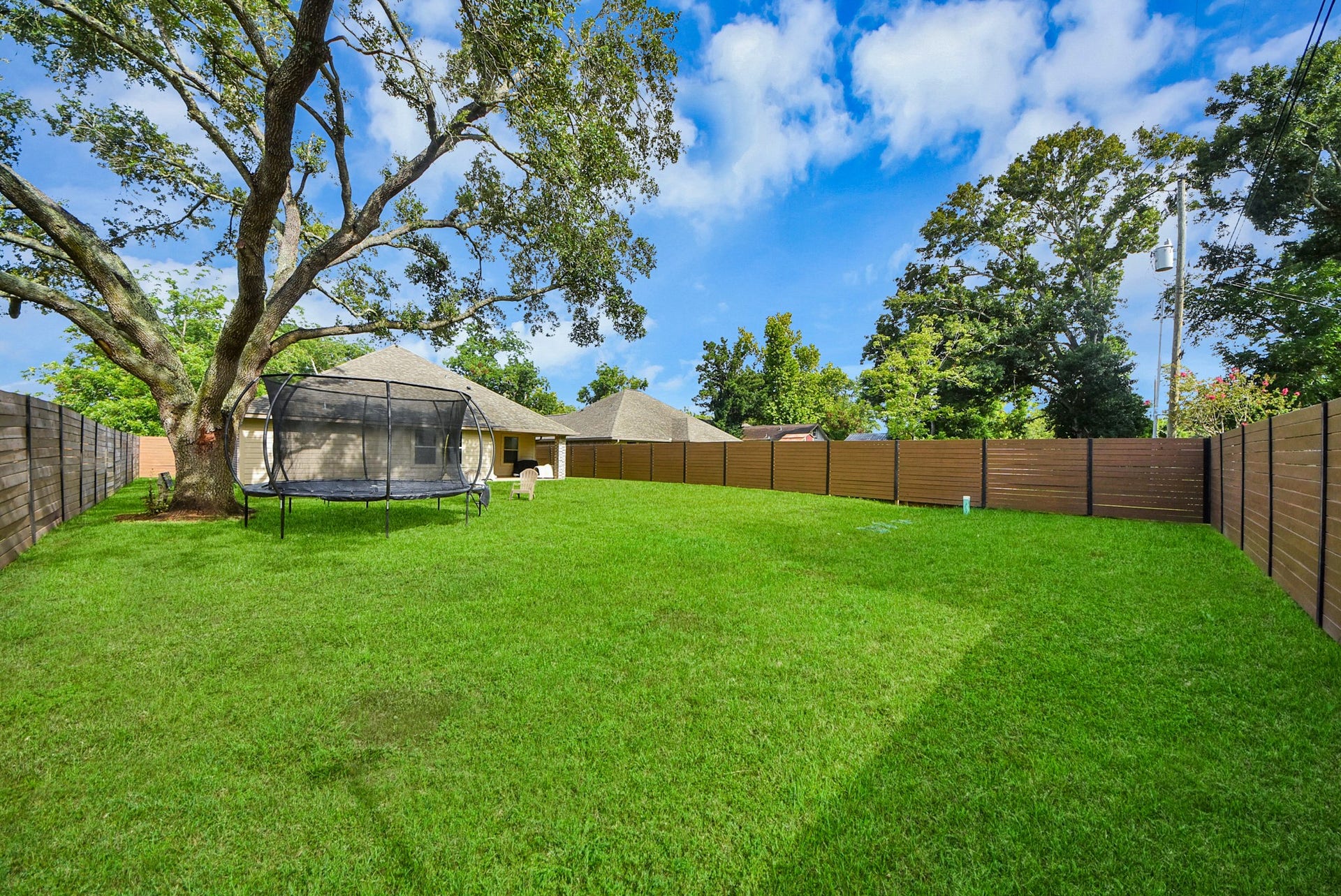 1023 S Anderson Street, Angleton, TX 77515 nother view showcasing the generous outdoor space