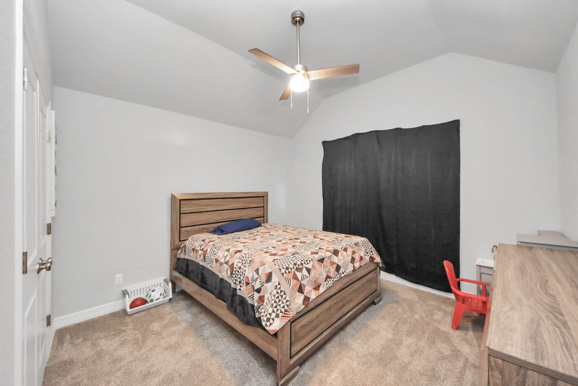 1023 S Anderson Street, Angleton, TX 77515 Comfortable secondary bedroom offering versatility for family or guests