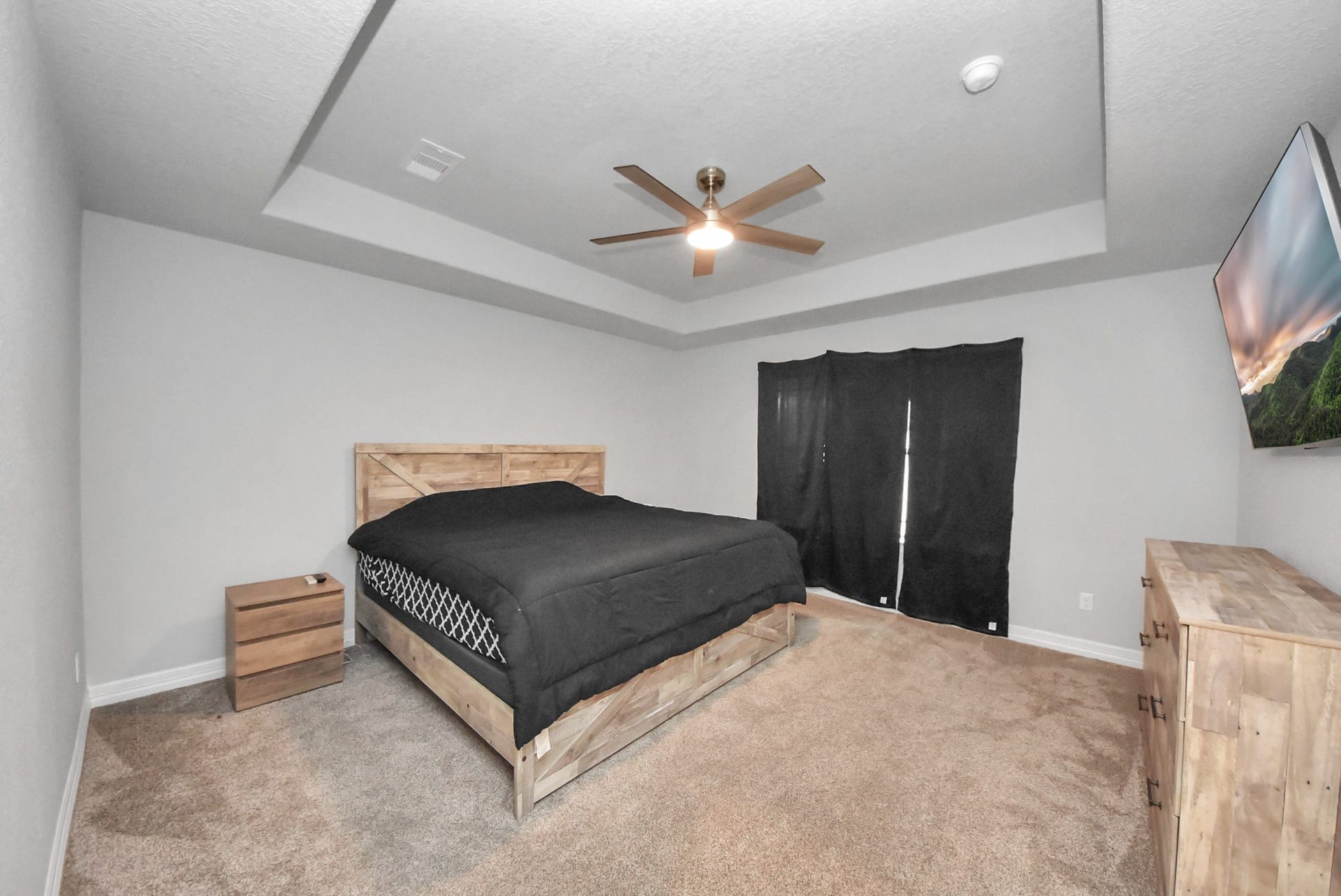 1023 S Anderson Street, Angleton, TX 77515 Spacious primary suite offering a comfortable private retreat