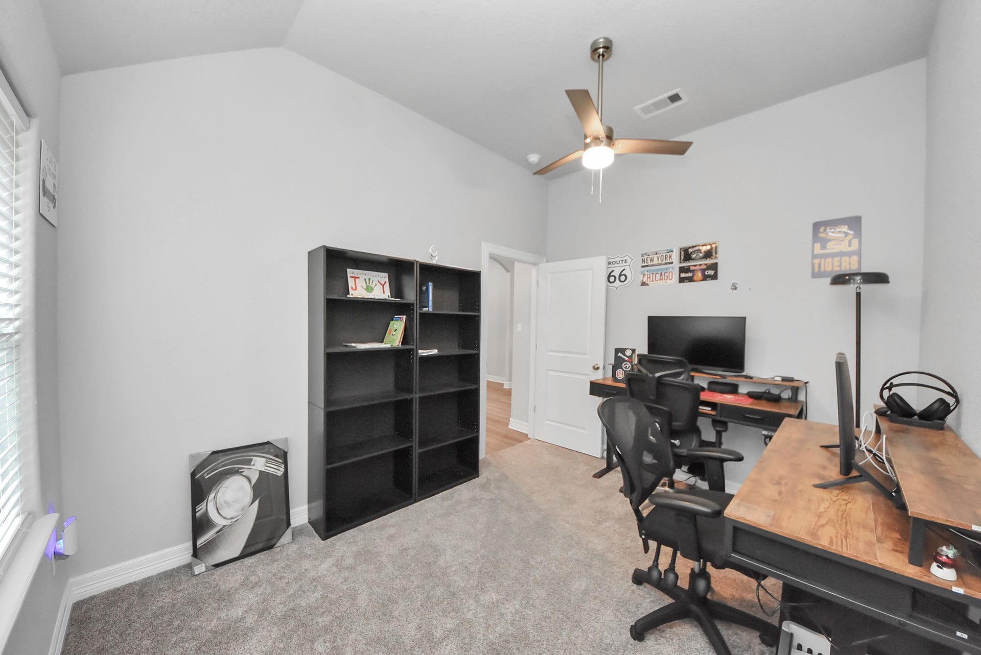 1023 S Anderson Street, Angleton, TX 77515 Additional bedroom ideal for guests, a home office, or personal use