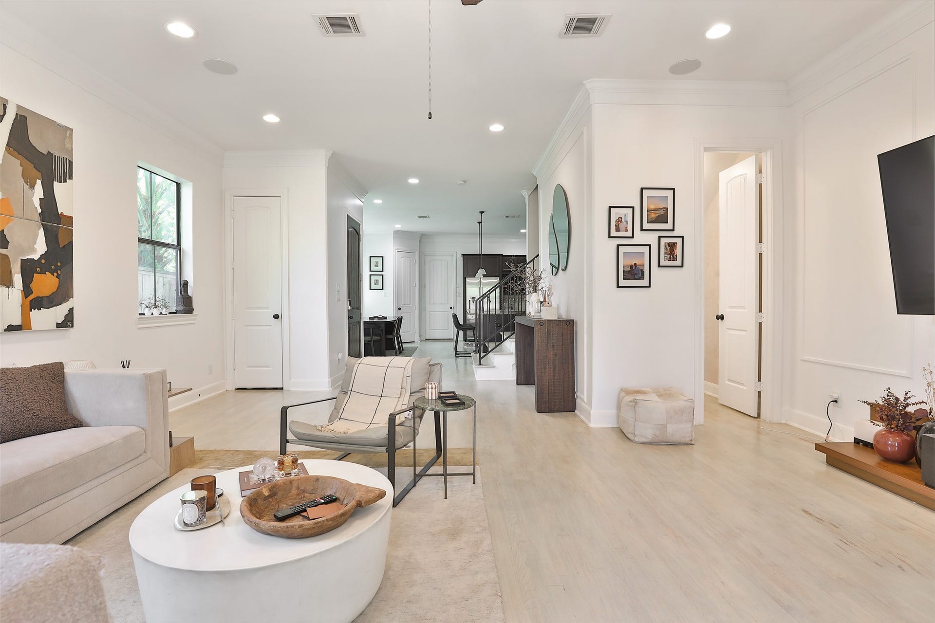 1112 Bingham Street, Houston, TX 77007 Bright and inviting living area with modern decor, open layout, and abundant natural light, perfect for relaxation and entertaining.