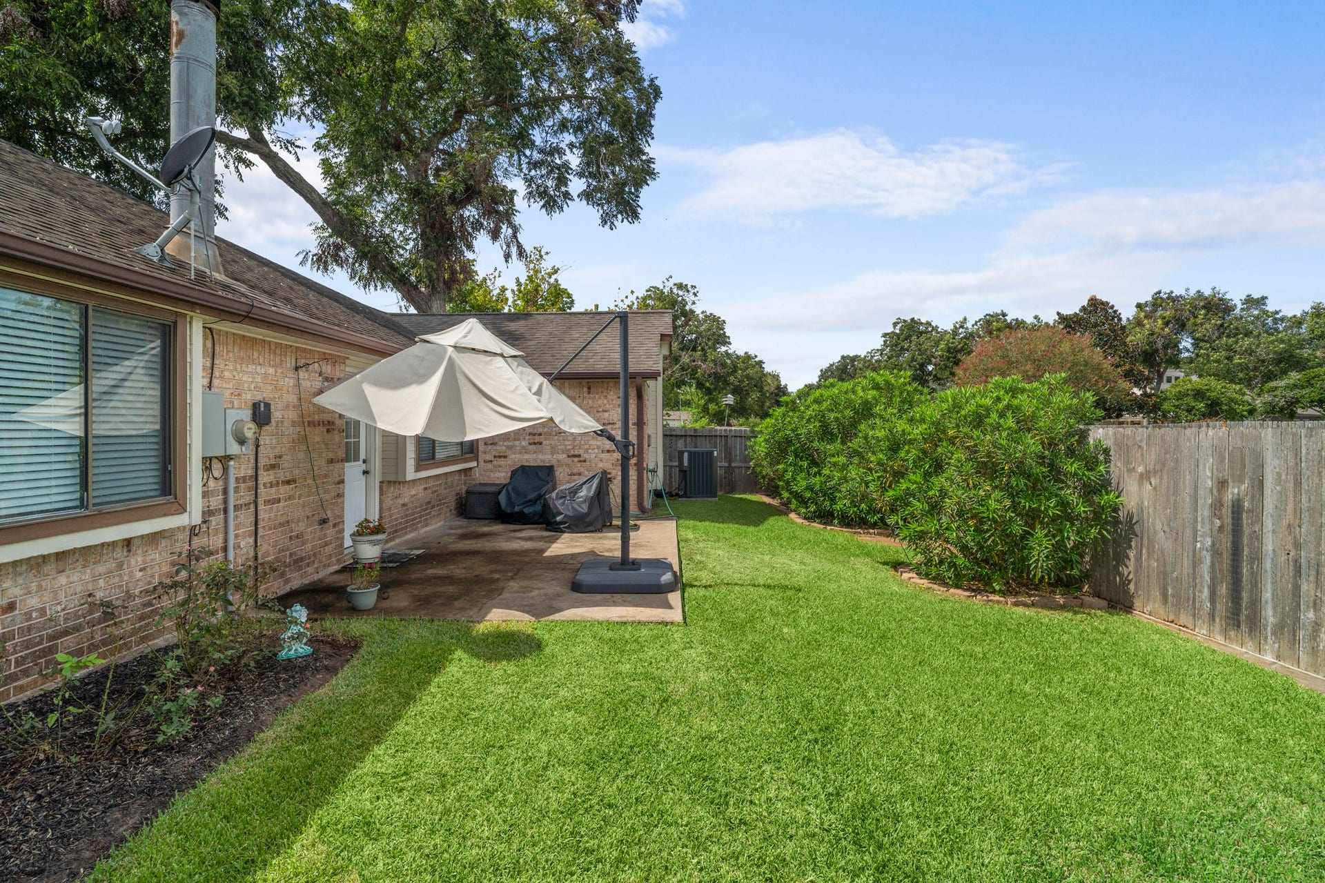 2437 Willow Bend Drive, Richmond, TX 77406 Well manicured backyard with a patio. No back neighbors is a plus!