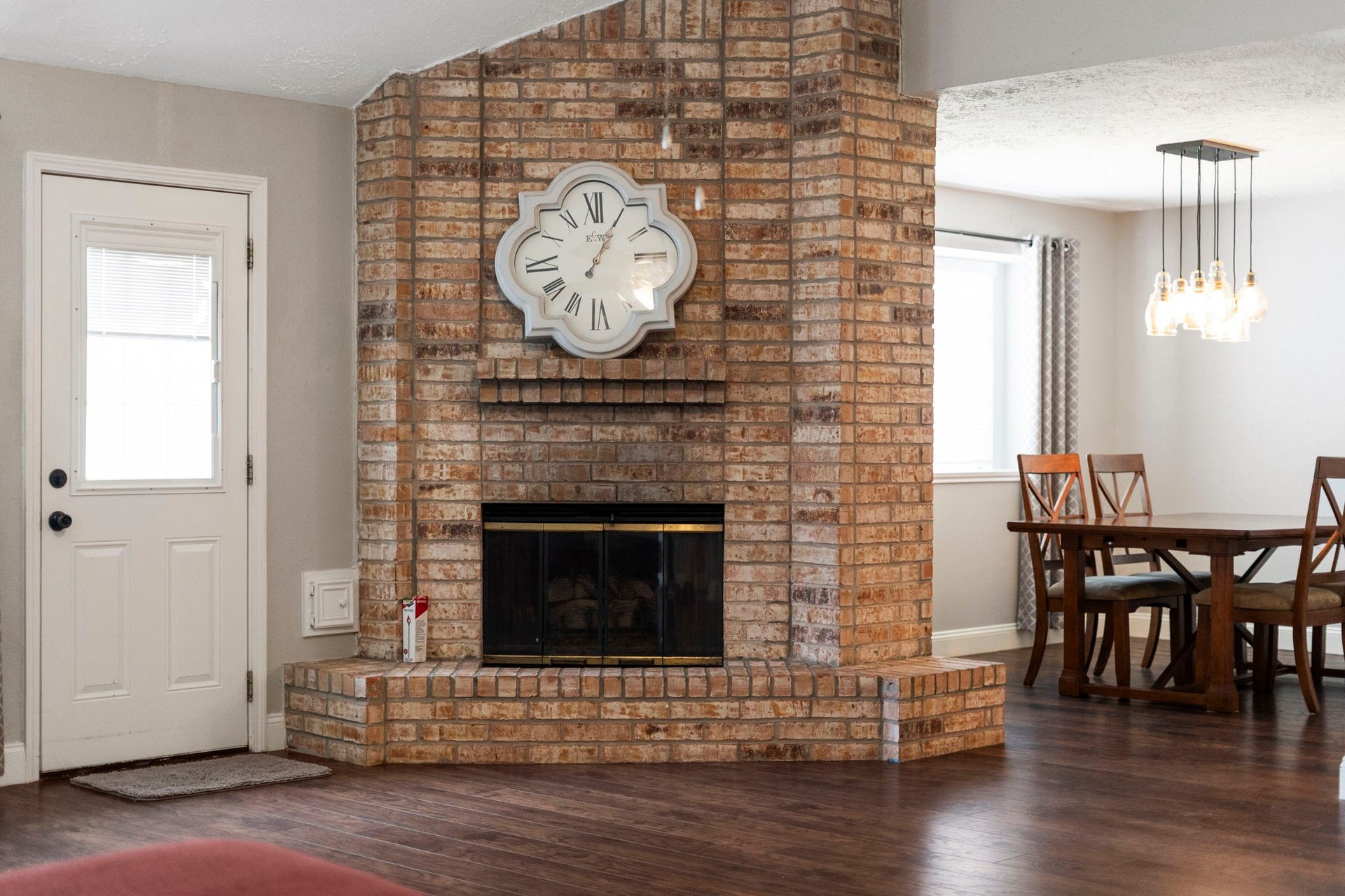 2437 Willow Bend Drive, Richmond, TX 77406 Floor to ceiling brick gas log fireplace is the perfect ambience for those cooler evenings.