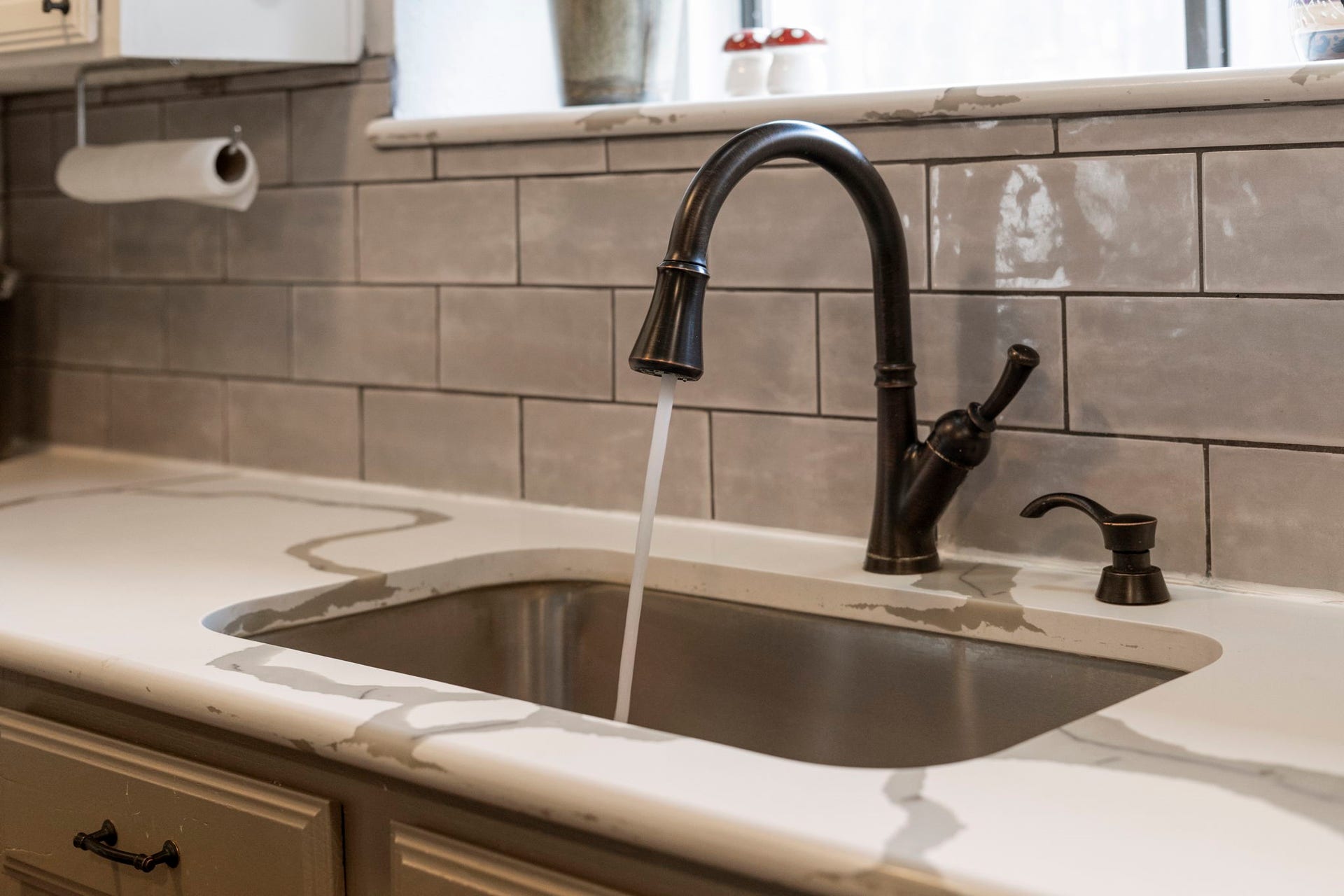 2437 Willow Bend Drive, Richmond, TX 77406 Beautiful Quartz counters and a farmhouse sink add a nice touch.