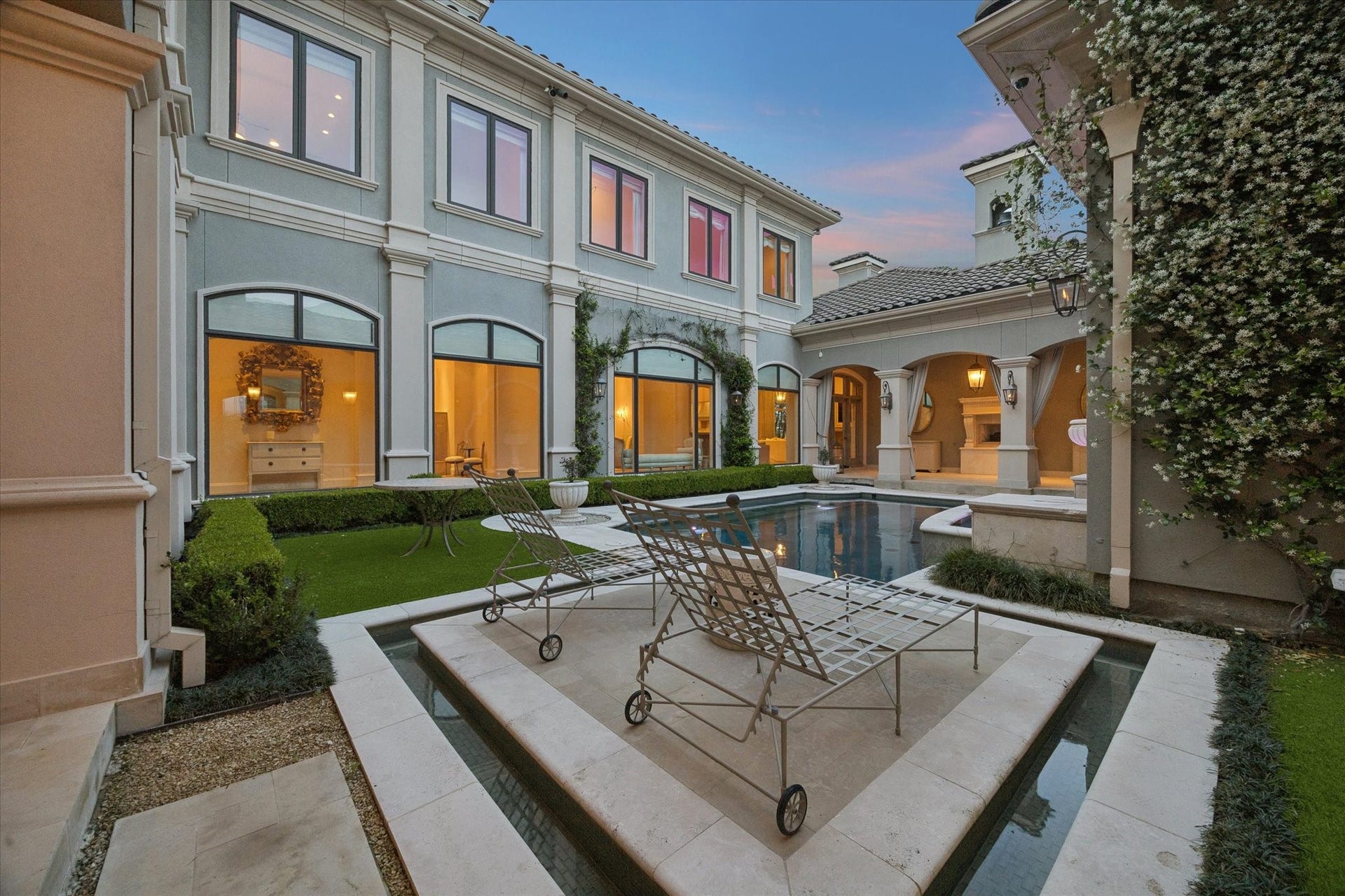 An unforgettable first impression as you enter the private courtyard gates to this estate. It offers both privacy and a seamless connection to the home's living spaces.