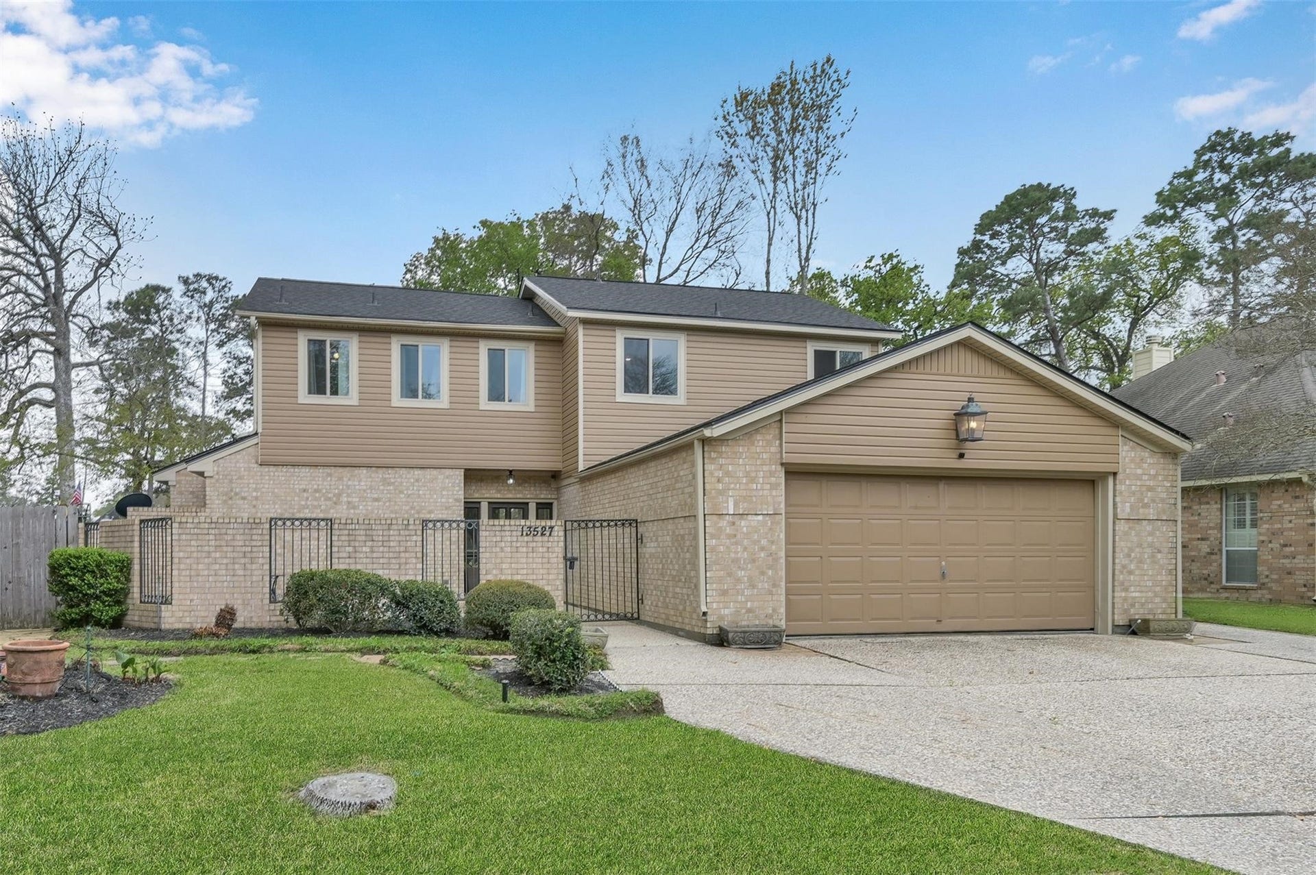 Welcome home to 13527 Summer Hill, where spacious living meets scenic golf course views. This 4-bedroom, 2.5-bath home is perfectly positioned along Hole #2 of the Walden on Lake Conroe Golf Course.