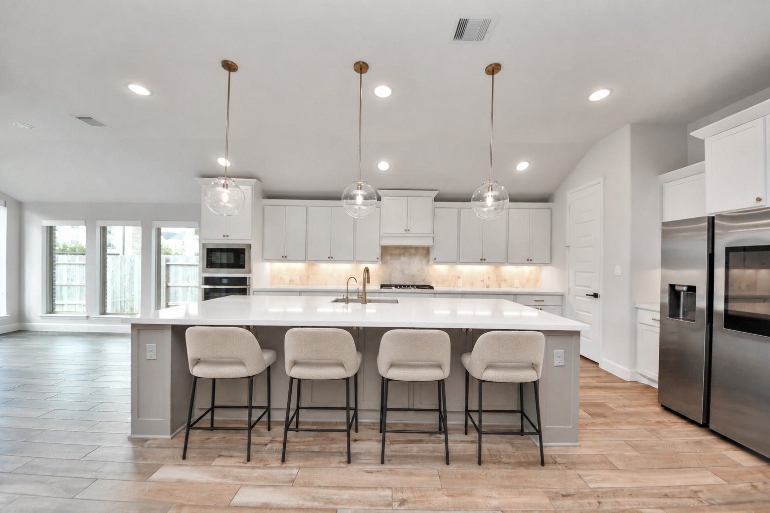 24319 Norwood Groves Drive, Richmond, TX 77469 Virtually staged kitchen with huge kitchen island.