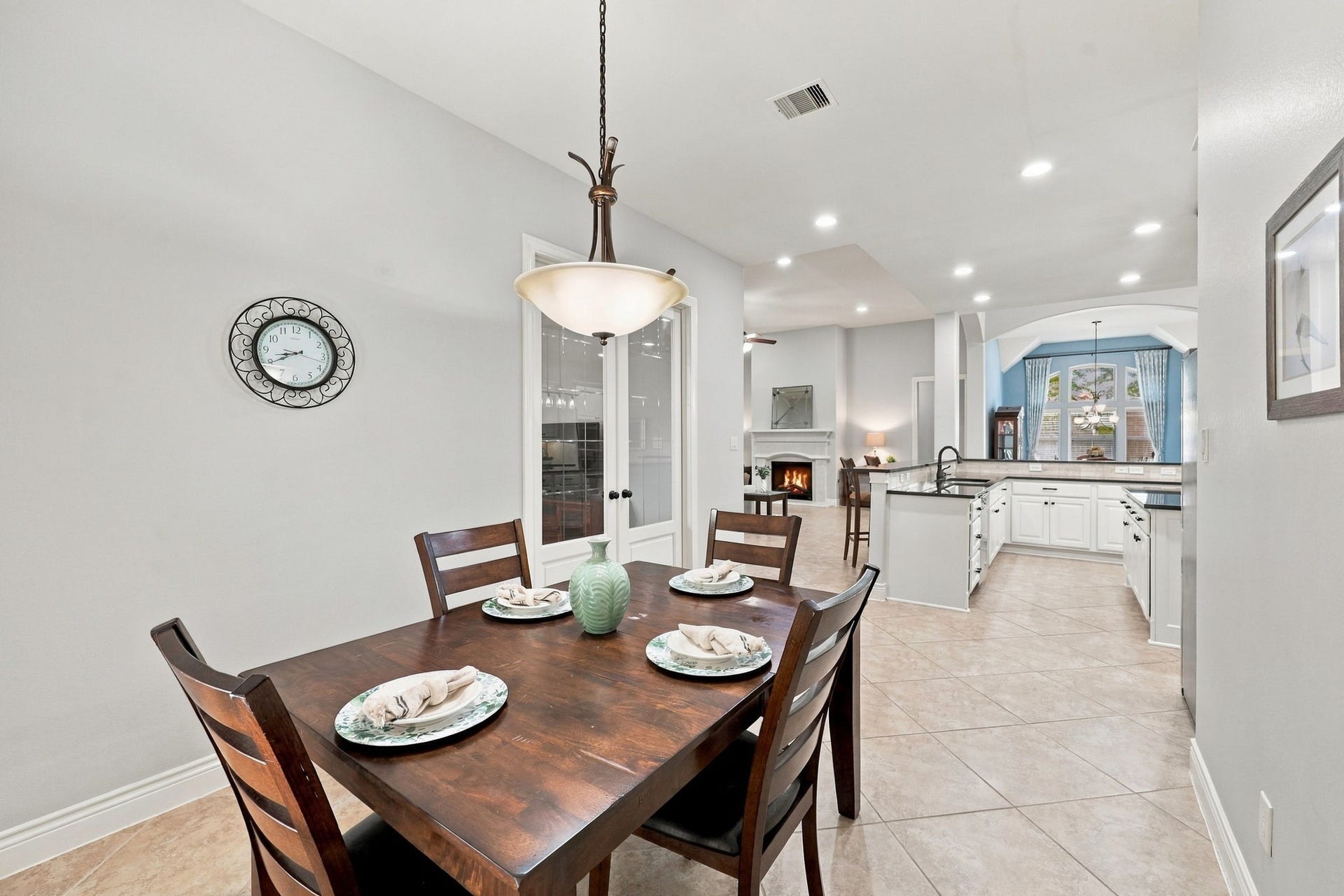 27302 Liberty Heights Lane, Fulshear, TX 77441 This view from the Breakfast area highlights its convenient proximity to the kitchen, creating an easy flow between meal preparation and casual dining.
