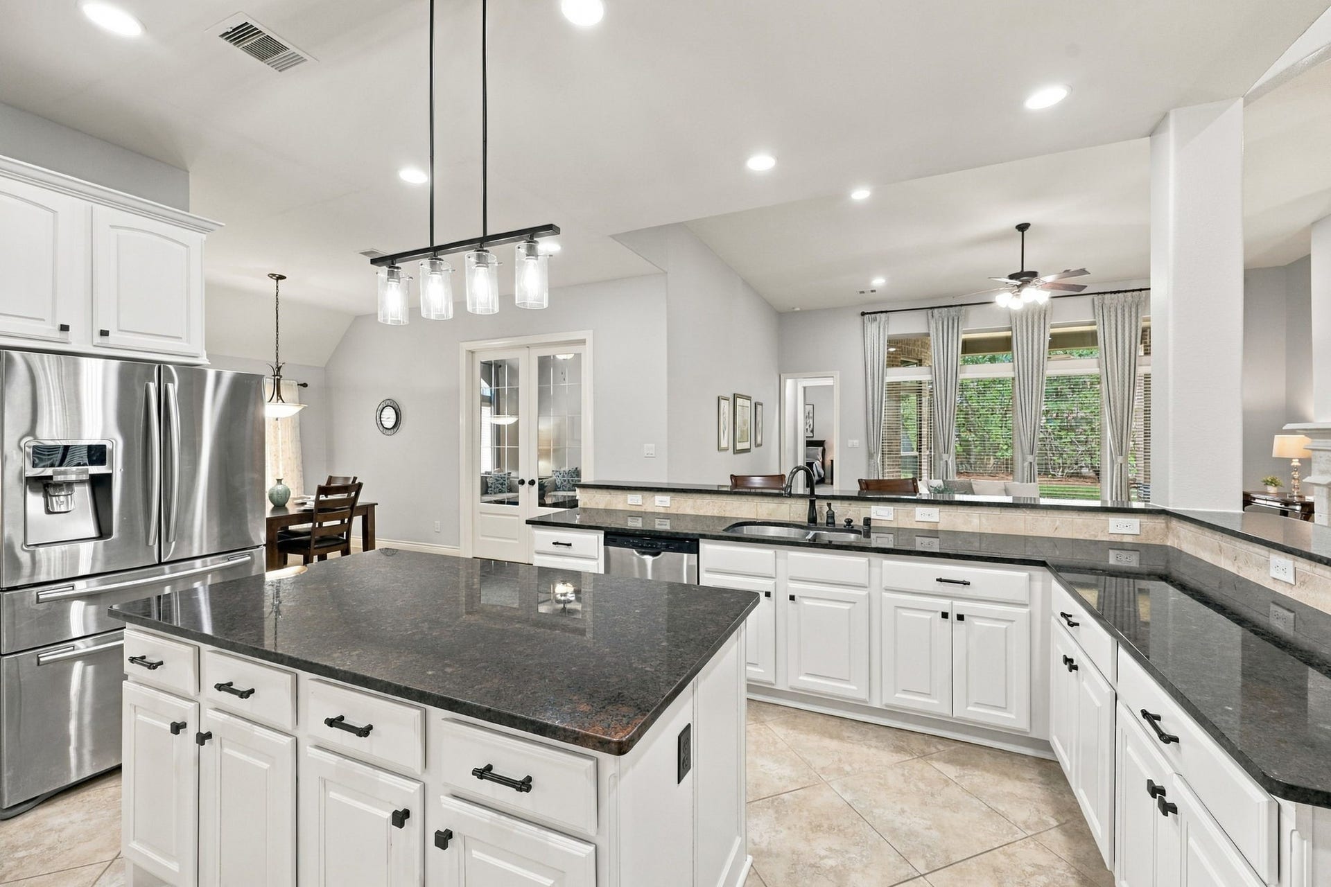 27302 Liberty Heights Lane, Fulshear, TX 77441 Additional Kitchen highlights include a stainless steel undermount sink paired with an elegant oil-rubbed bronze gooseneck faucet. An added bonus for the new homeowner, the Samsung kitchen refrigerator will remain with the home!