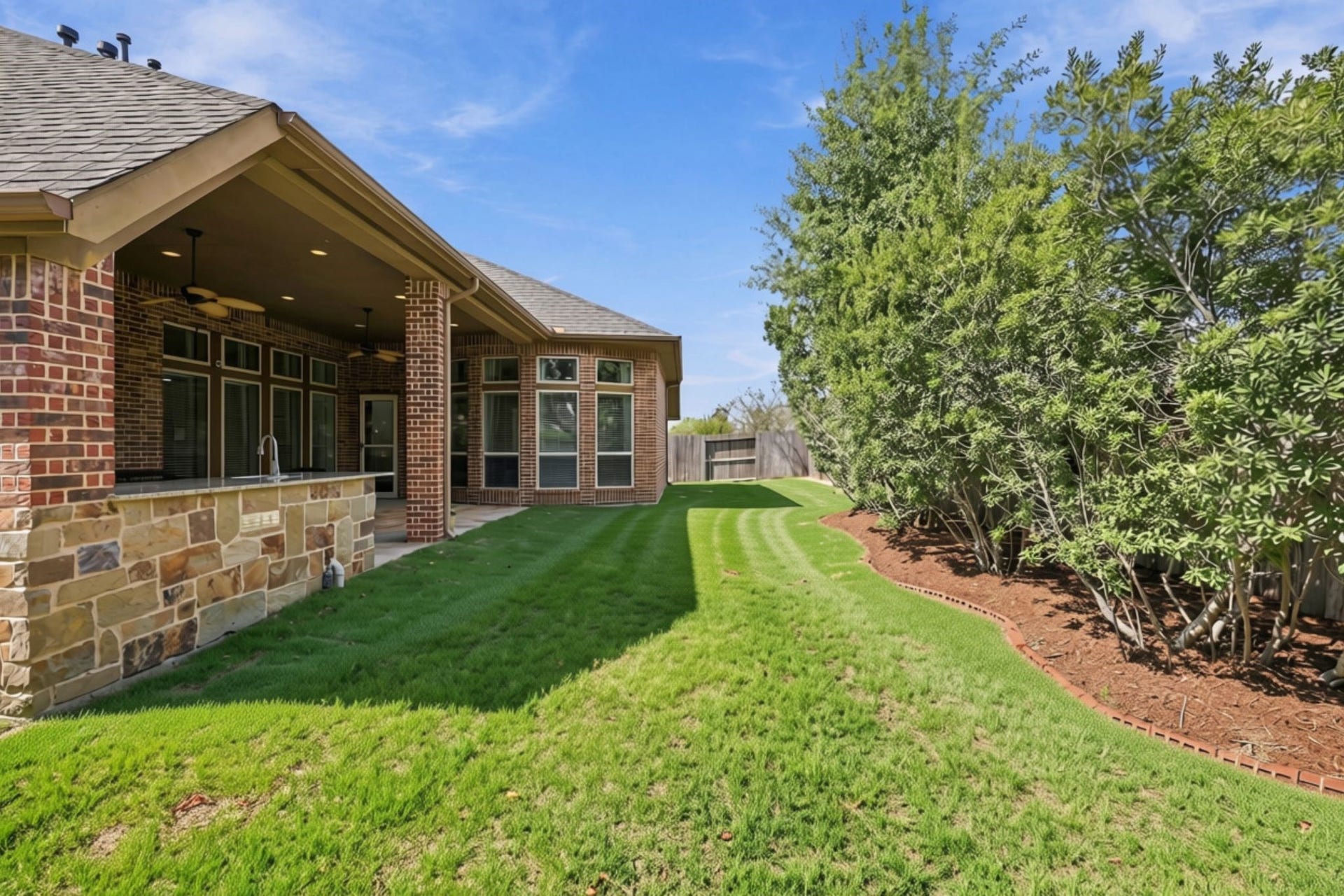27302 Liberty Heights Lane, Fulshear, TX 77441 Looking down the length of the backyard, you'll appreciate the generous outdoor space with plenty of room for children to play, pets to roam, and family and friends to enjoy the outdoors.
