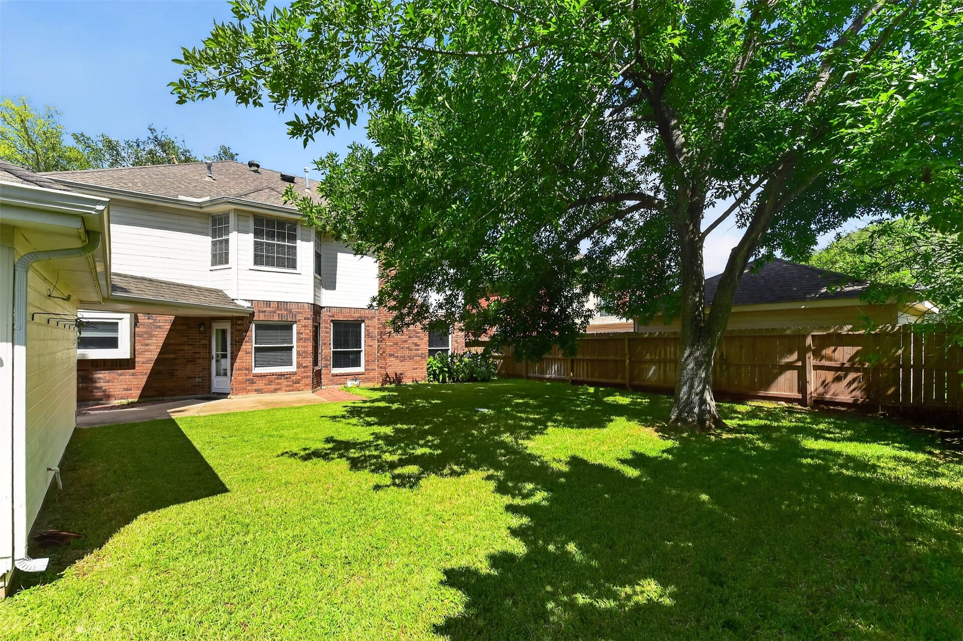 Shade trees and lots of green space for the enjoyment of your pets, family, and friends.