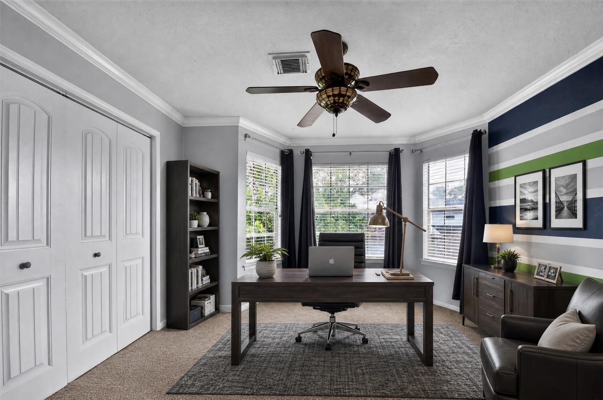 This rendering shows the room being used as an office.
