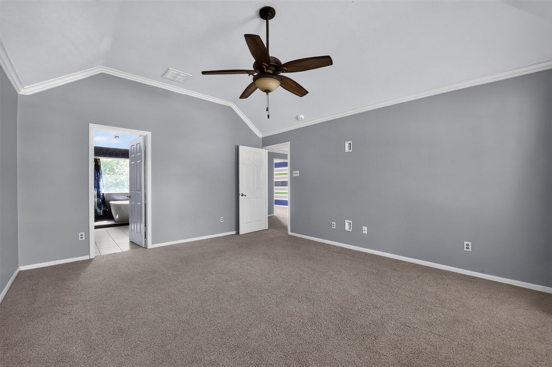 Retire after a long day to your elegant primary suite.