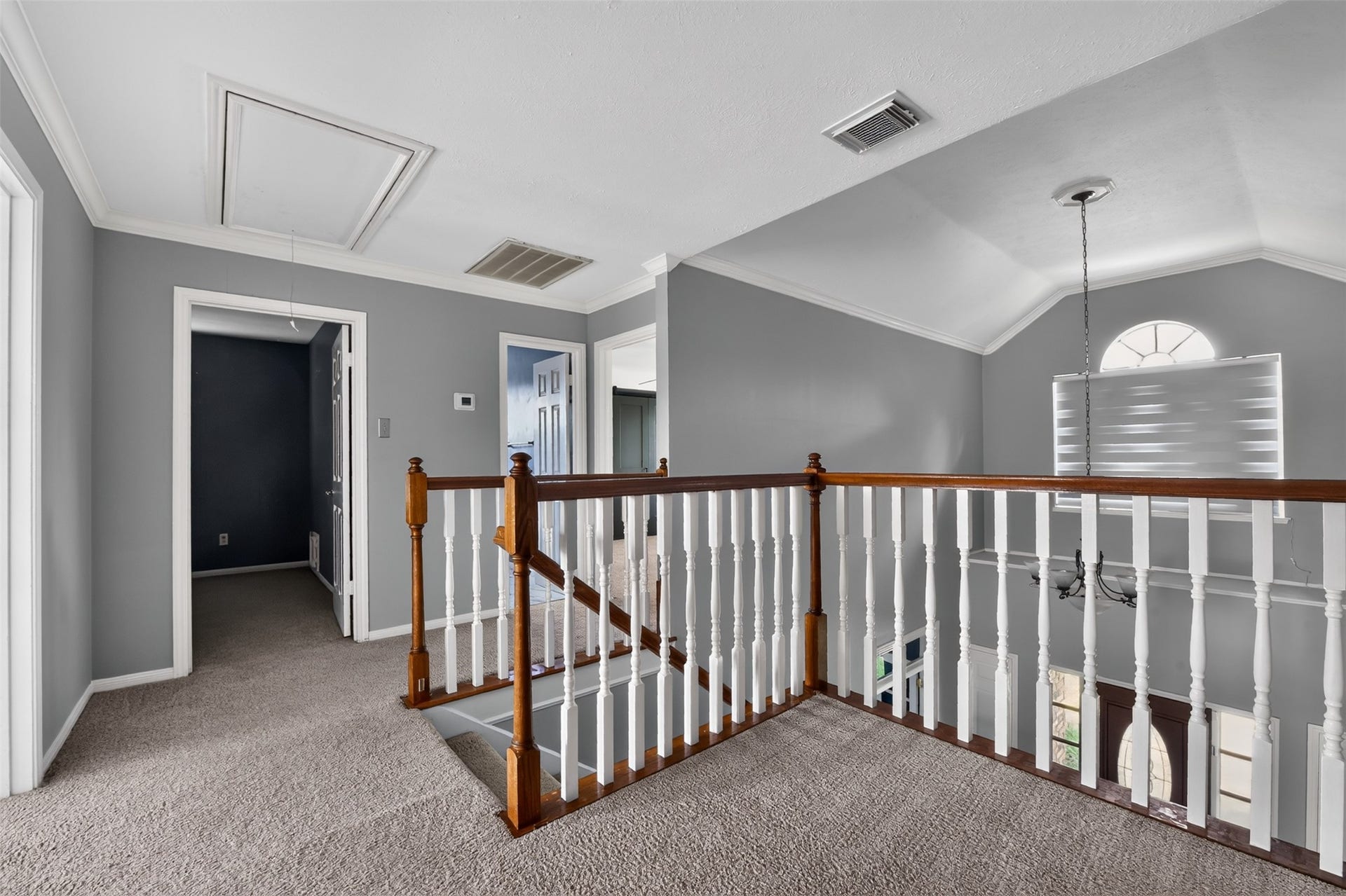 Head up the staircase to explore the four bedrooms and two full bathrooms.