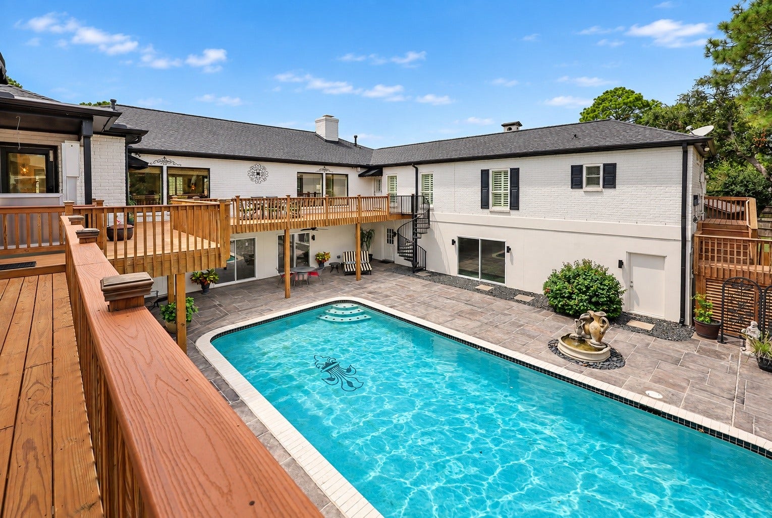 18607 Point Lookout Drive, Nassau Bay, TX 77058 Another view of the beautiful pool area standing in front of the pool house.