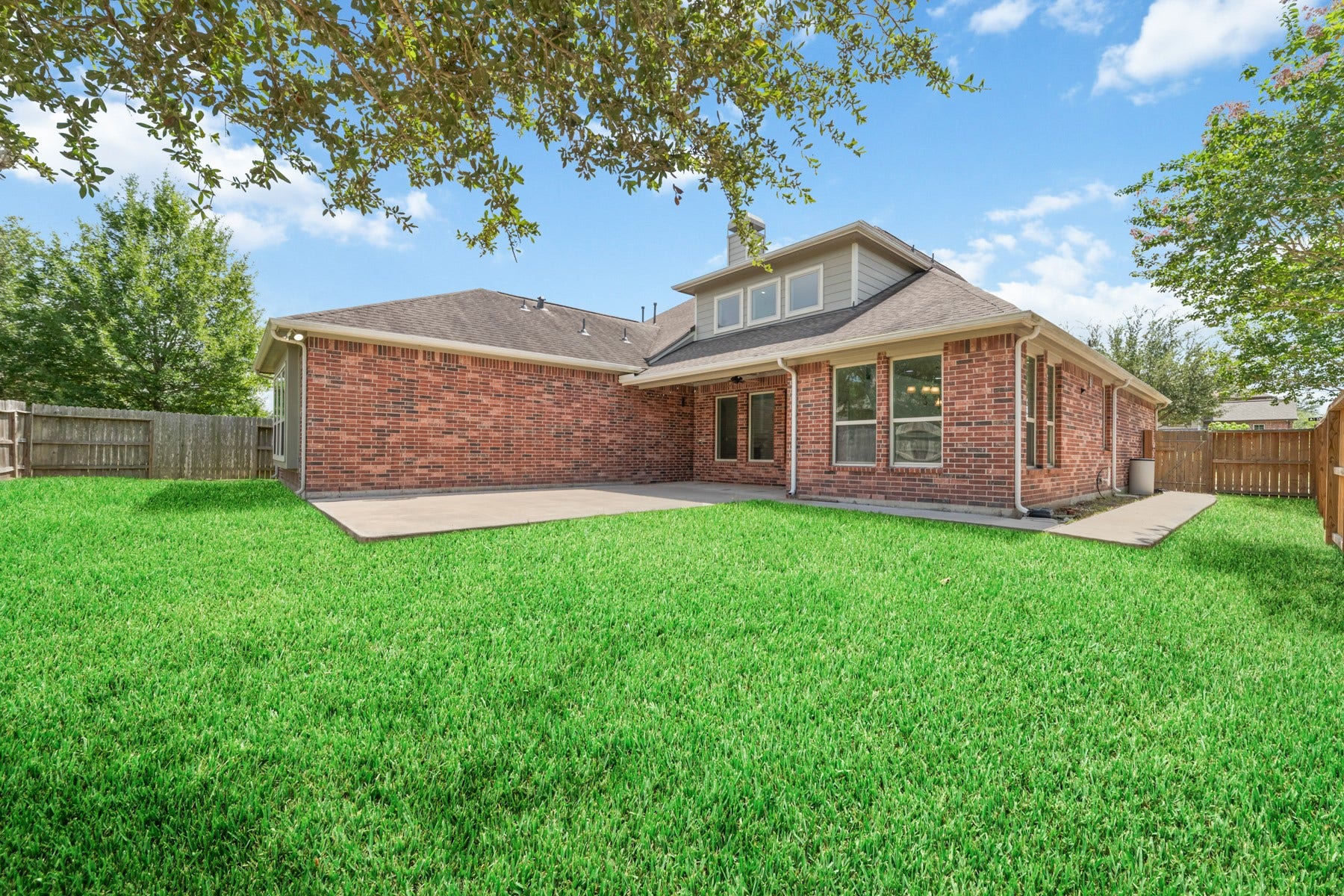11103 Dowbeck Avenue, Richmond, TX 77407 The expansive backyard is perfect for creating your own outdoor oasis, with plenty of room for a pool, outdoor kitchen, and entertaining.