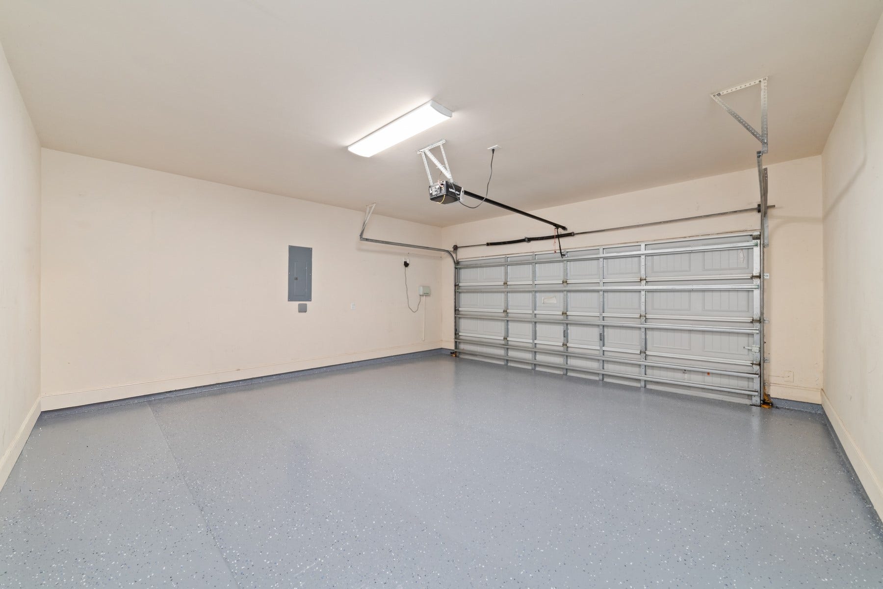 11103 Dowbeck Avenue, Richmond, TX 77407 2-car garage with a durable epoxy-coated floor for a clean, finished look