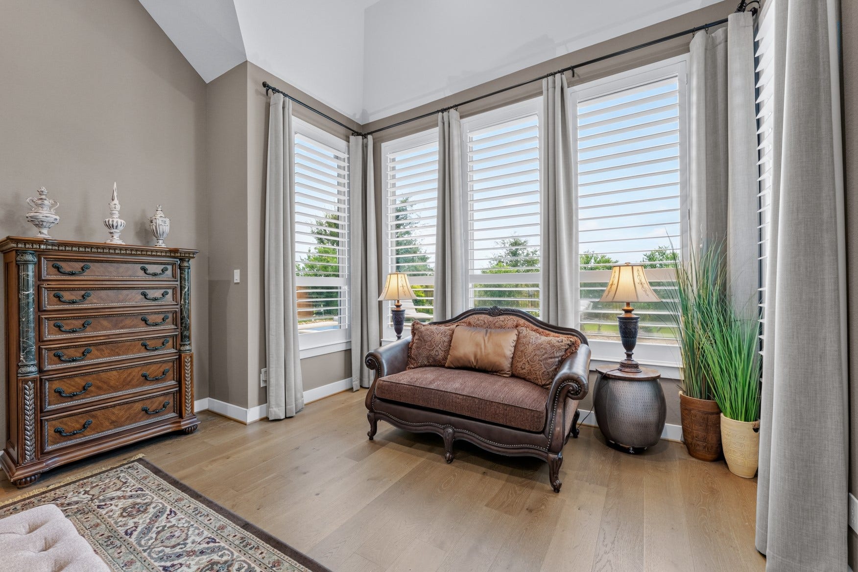 2214 Almond Creek Lane, Fulshear, TX 77423 Enjoy views of the pool and lush landscaping in the backyard.