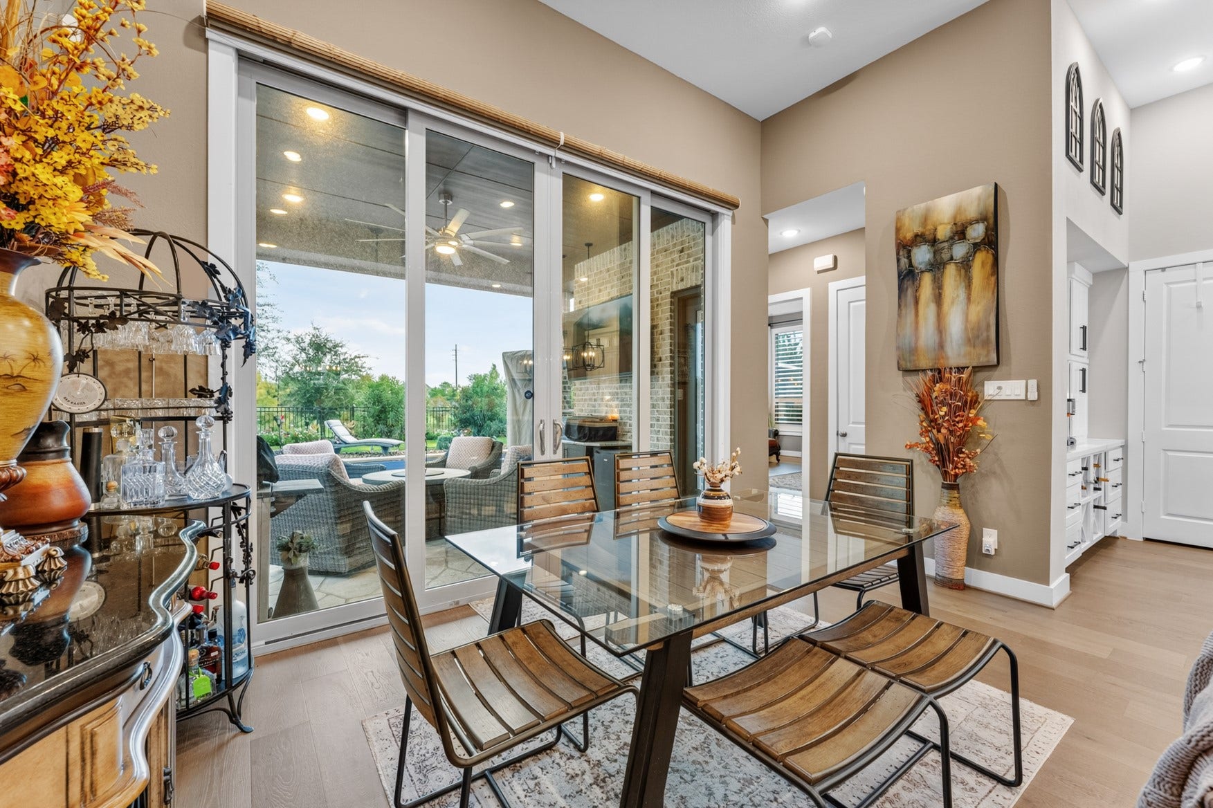 2214 Almond Creek Lane, Fulshear, TX 77423 Your spacious breakfast area is a sunny spot to relax and share casual meals. Enjoy the view of the pool and backyard.