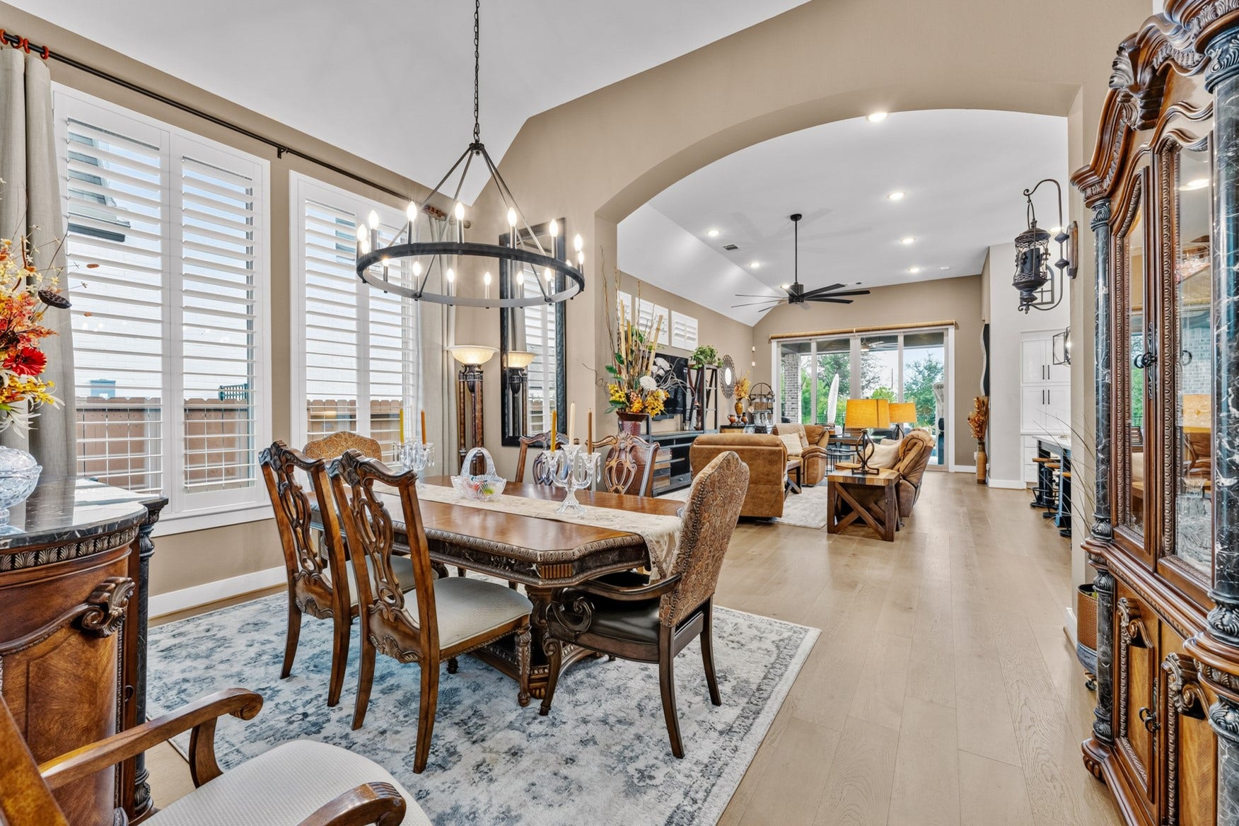 2214 Almond Creek Lane, Fulshear, TX 77423 The formal dining area with its two tall windows is a great spot to enjoy meals with family and friends. Easily accommodates large furniture! New recessed lights were added throughout the entire home.