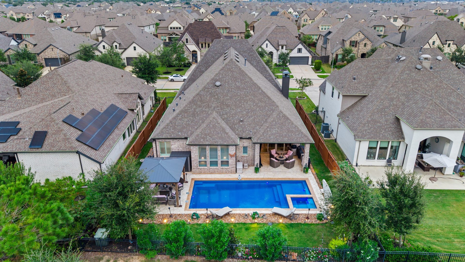 2214 Almond Creek Lane, Fulshear, TX 77423 One of very few homes in Jordan Ranch with a private pool already in place for you!