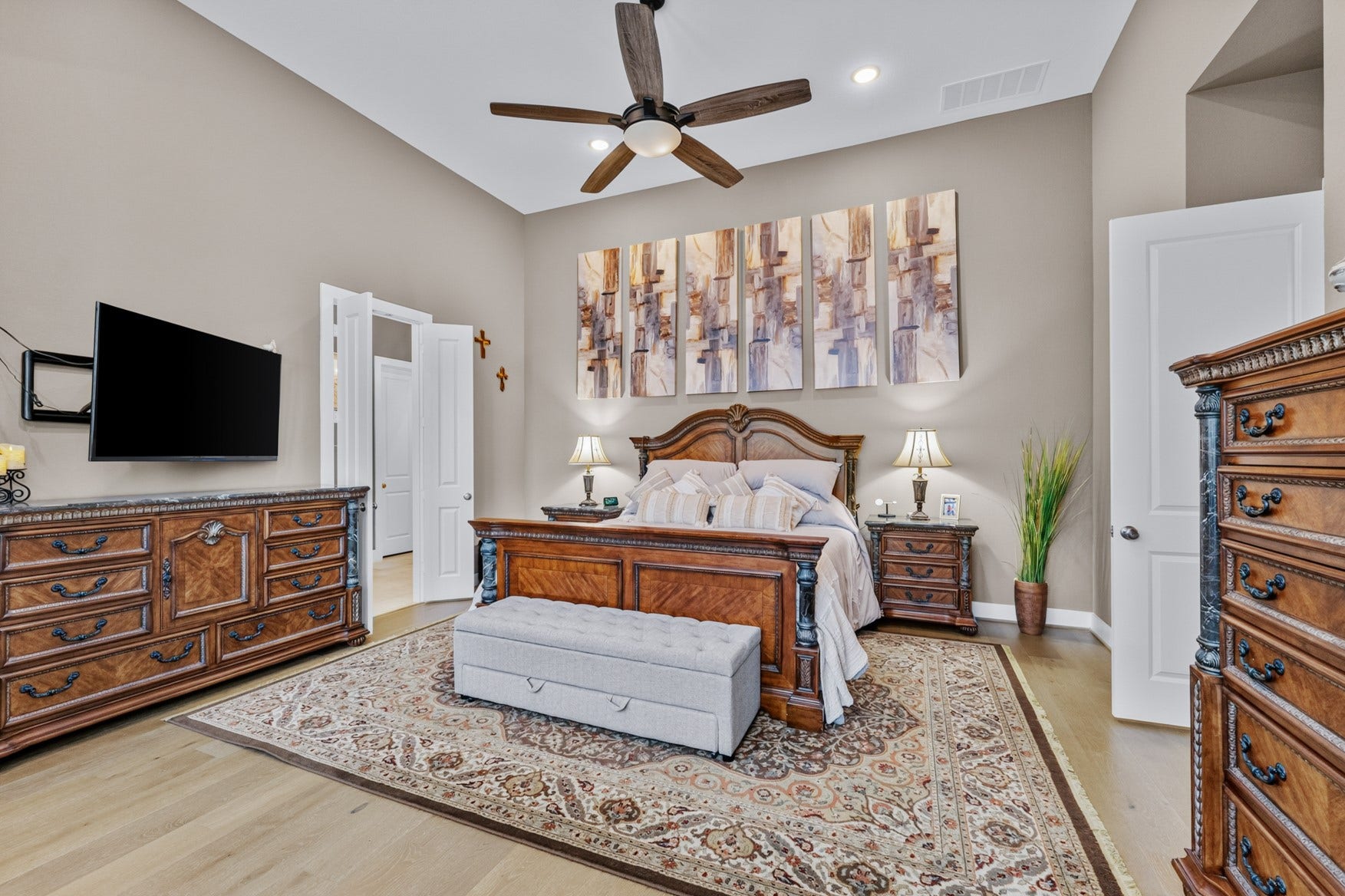 2214 Almond Creek Lane, Fulshear, TX 77423 Your primary suite is a true retreat with a soothing neutral color palette. Easily accommodates large furniture. Direct access to the patio and pool.