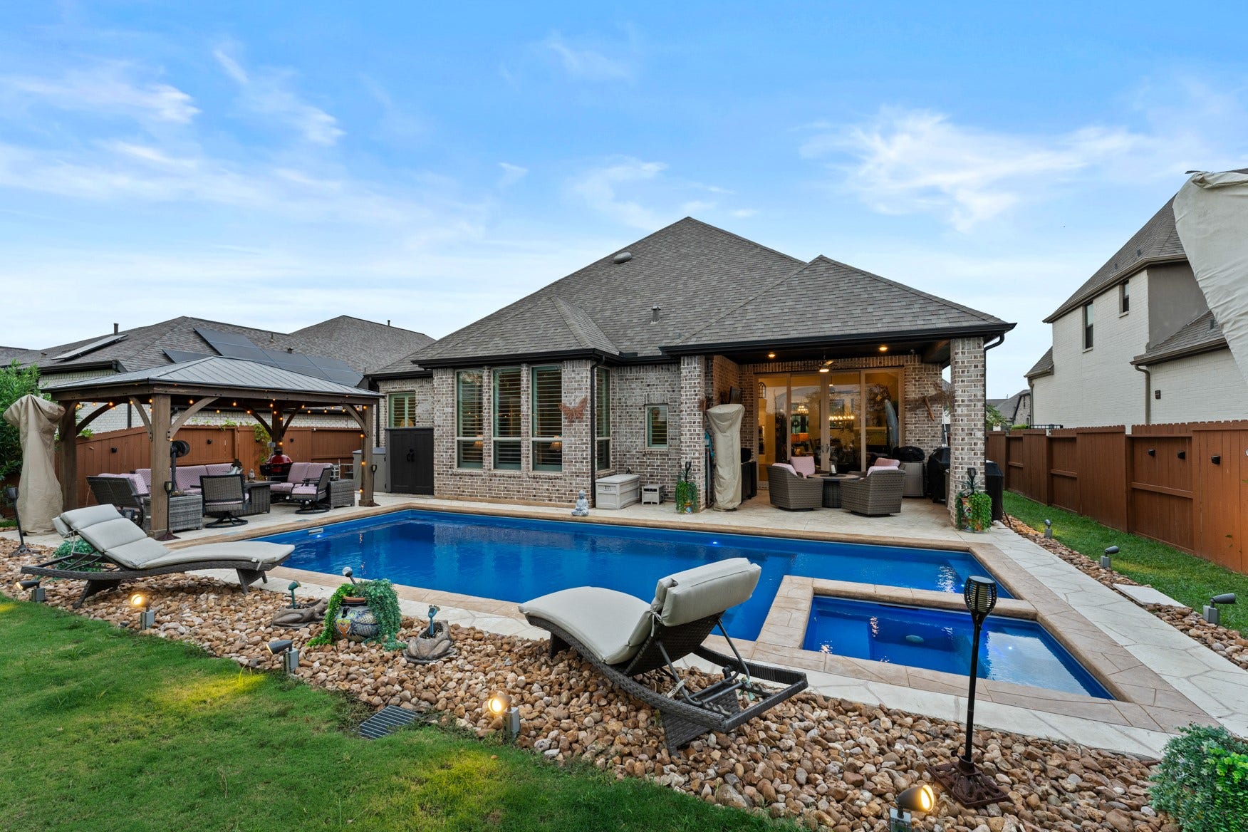 2214 Almond Creek Lane, Fulshear, TX 77423 A true backyard oasis ready for relaxing as well as entertaining - fun for everyone!