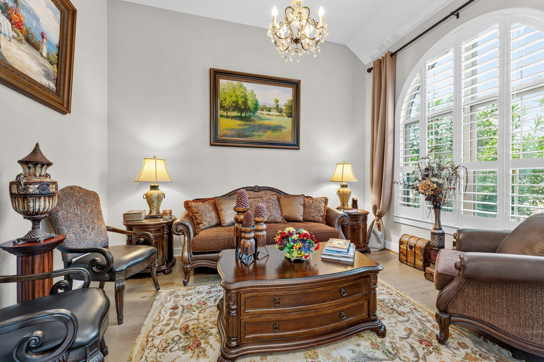 2214 Almond Creek Lane, Fulshear, TX 77423 The front office is a flex space that can be used to fit your needs. A beautiful, large arched window with custom plantation shutters is a focal point for the room.