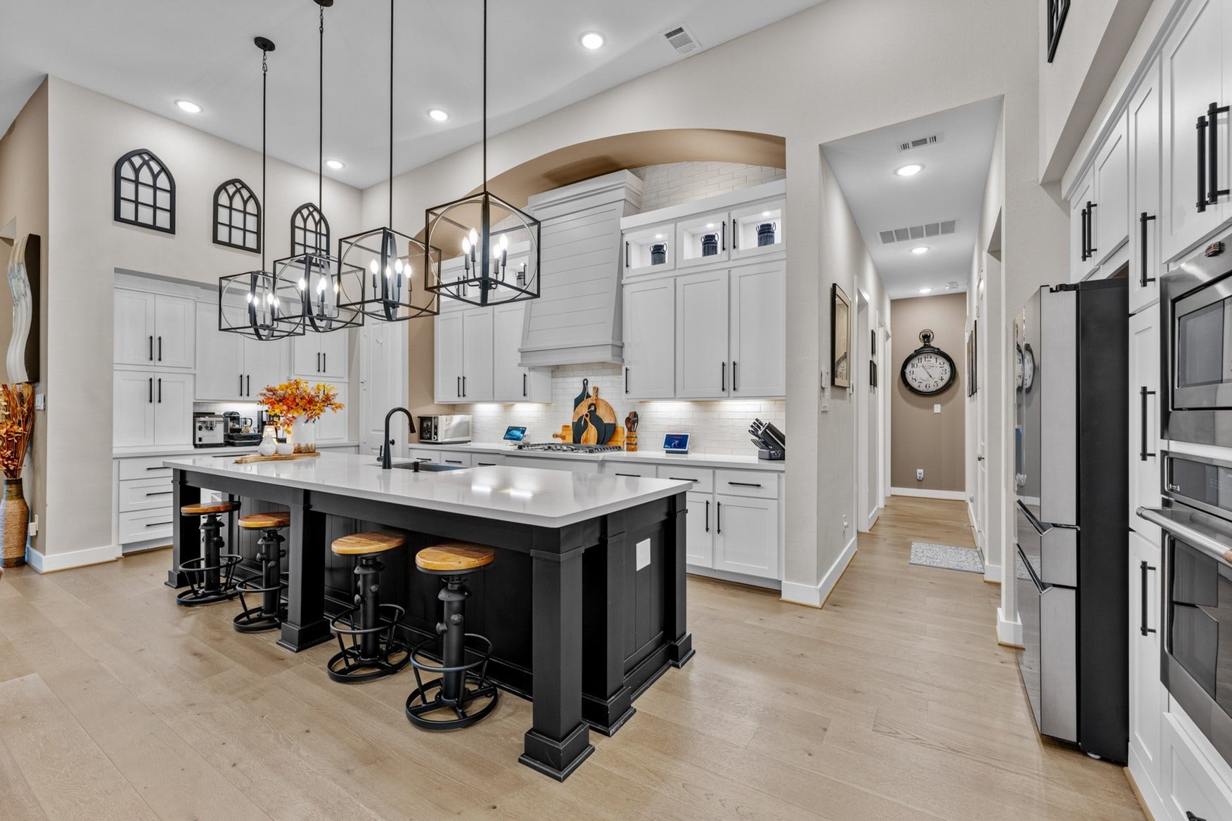 2214 Almond Creek Lane, Fulshear, TX 77423 This dreamy kitchen with on-trend lighting is ready for cooking, baking, and gatherings!