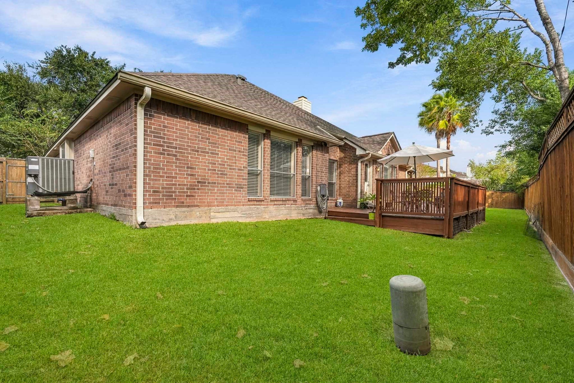 3905 Kimberly Drive, Pearland, TX 77581 Plenty of greenspace even with despite the deck and pool
