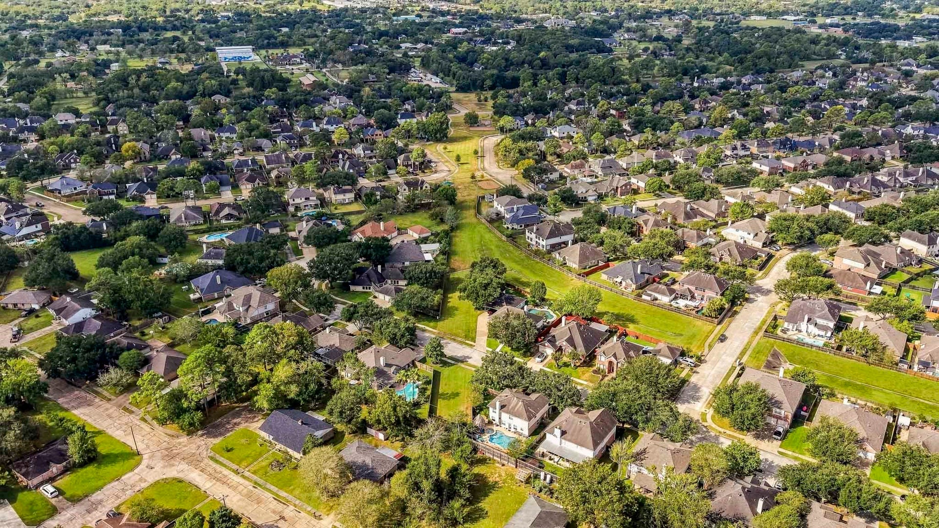 3905 Kimberly Drive, Pearland, TX 77581 Walk along the green space - about one block to the pool and layground!