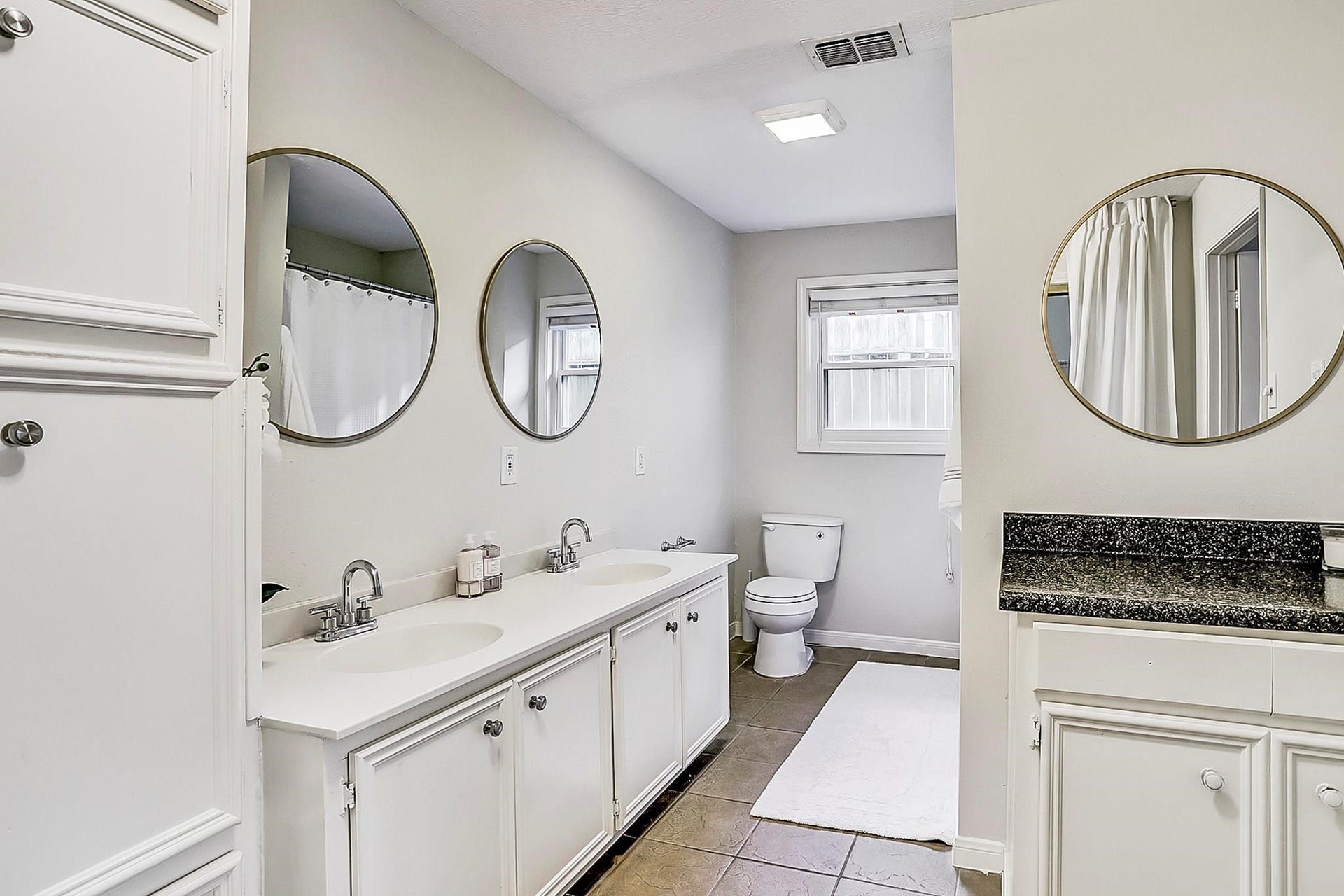 9402 Bevlyn Drive, Houston, TX 77025 Primary Bath: Double vanity, great storage.