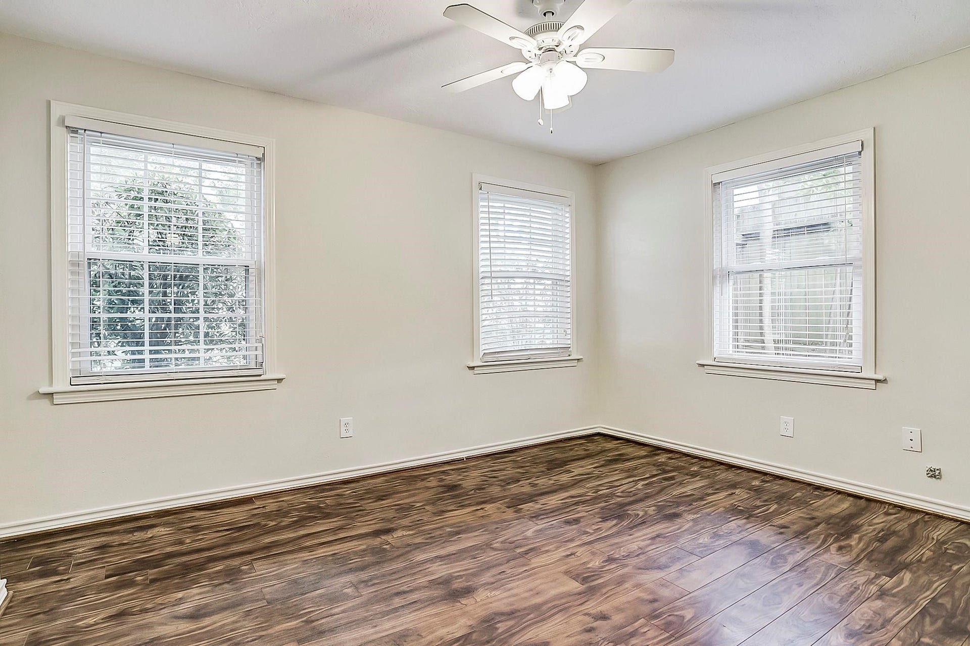 9402 Bevlyn Drive, Houston, TX 77025 Second Bedroom: (12x13) Windows for natural light, walk in closet, hardwood floors and ceiling fan.