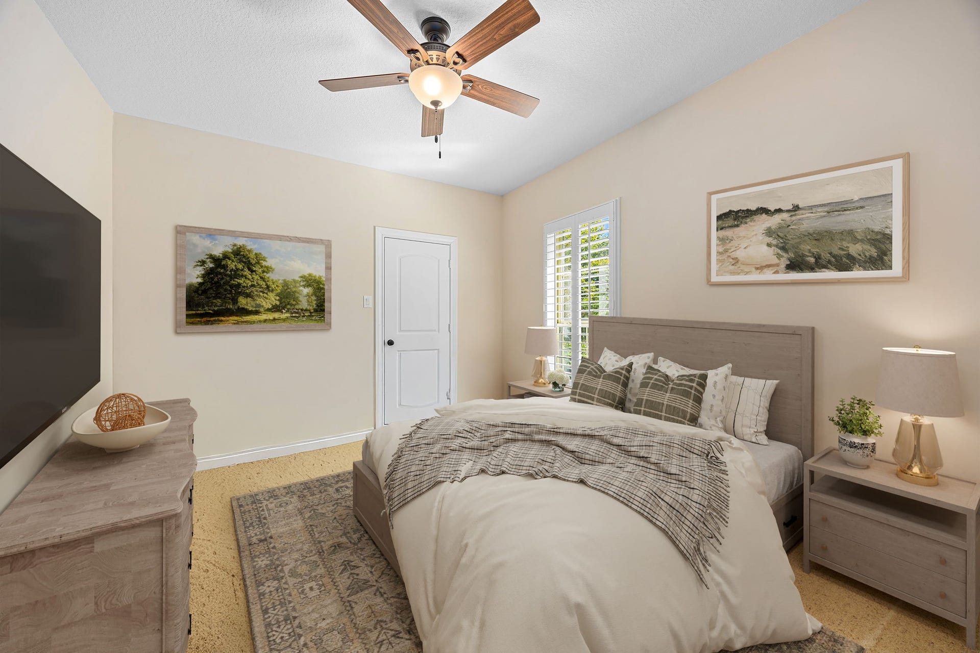 13506 Stagecoach Road, Magnolia, TX 77355 A cozy secondary bedroom offering soft natural light, plantation shutters, and a serene atmosphere ideal for guests or a peaceful personal retreat.