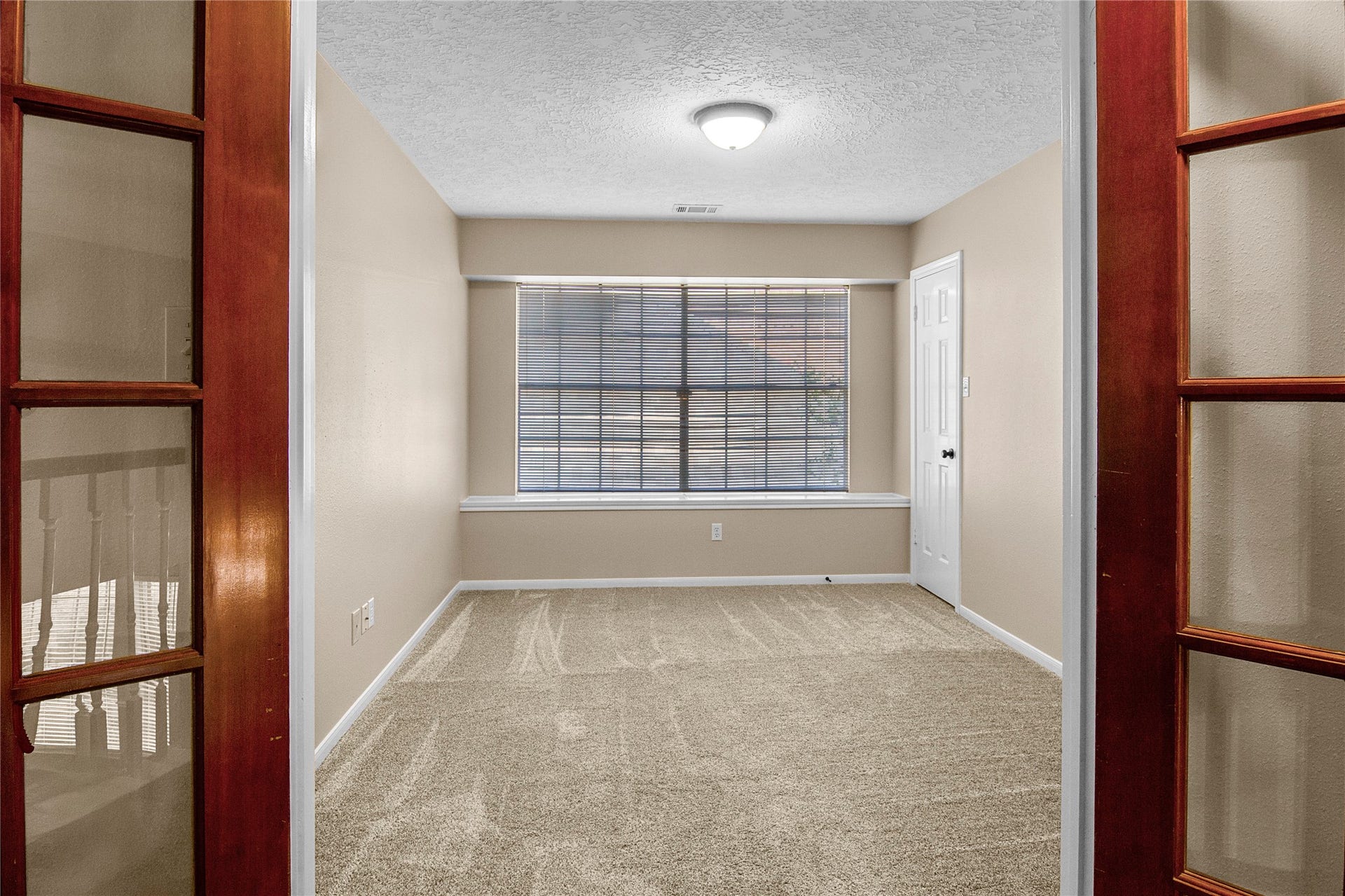 12503 Oakcroft Drive, Houston, TX 77070 flex room with double doors and a large closet