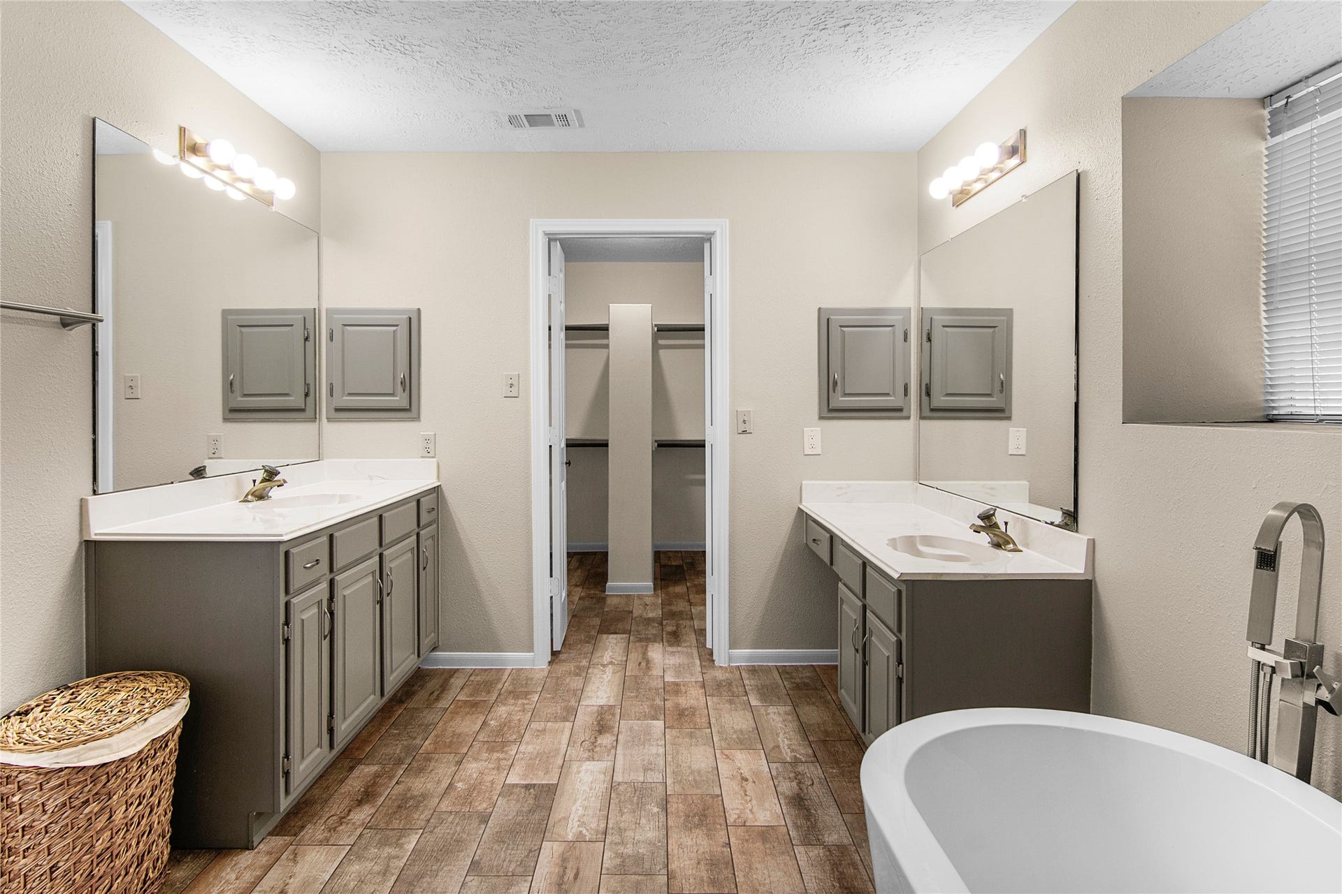 12503 Oakcroft Drive, Houston, TX 77070 two sinks, two vanities, and two sides of the closet