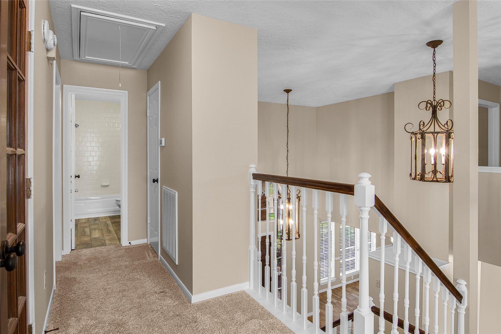 12503 Oakcroft Drive, Houston, TX 77070 here you can see the flex room doors, and a hall to one more bedroom and full bathroom
